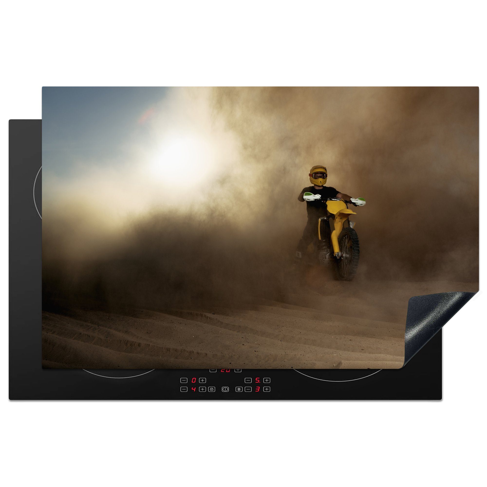 MuchoWow Herdblende-/Abdeckplatte Ein Mann auf einem gelben Motorrad in einer Staubwolke, Vinyl, (1 tlg), 81x52 cm, Induktionskochfeld Schutz für die küche, Ceranfeldabdeckung