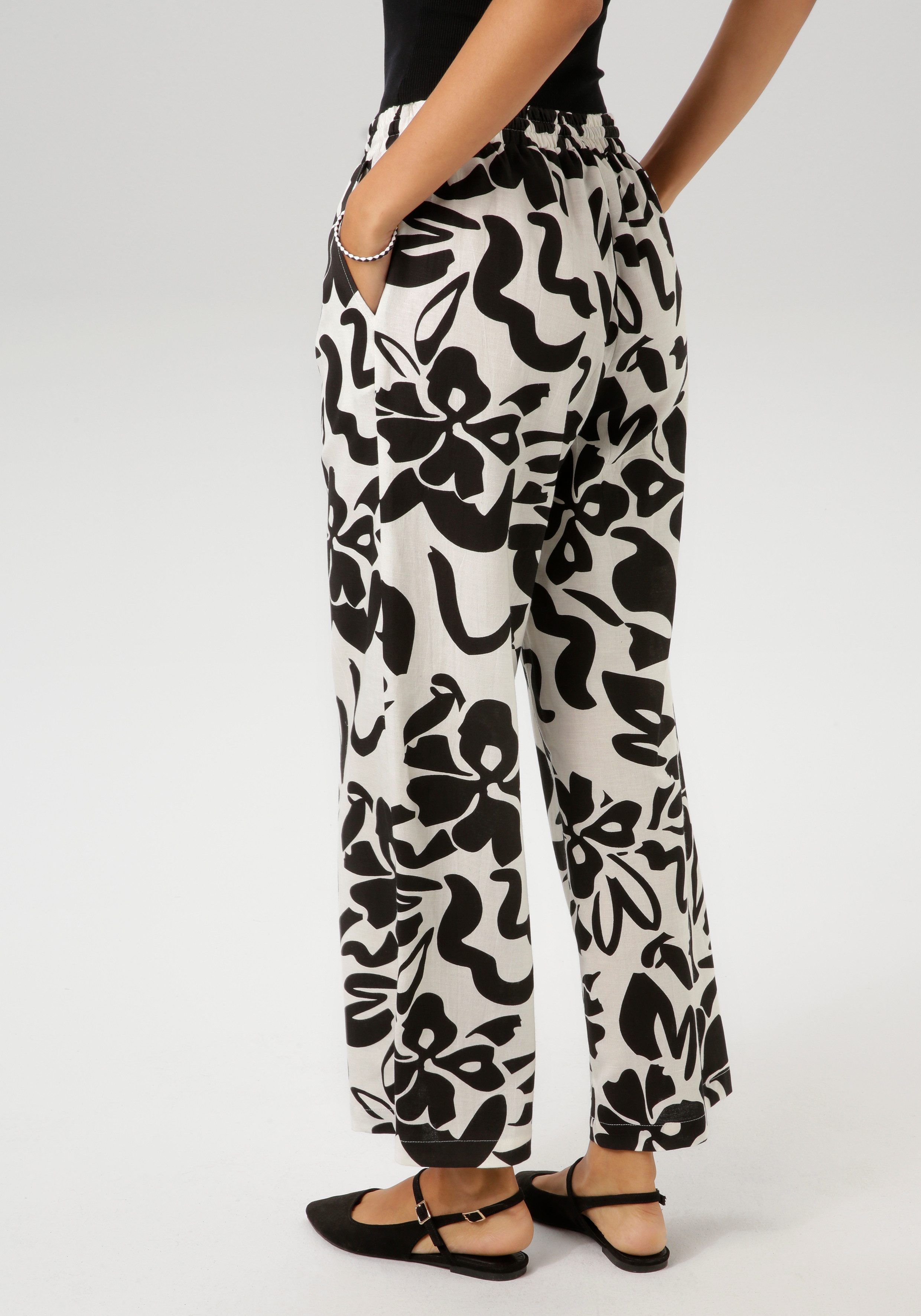 Aniston CASUAL Schlupfhose mit großflächigen Blättern bedruckt günstig online kaufen