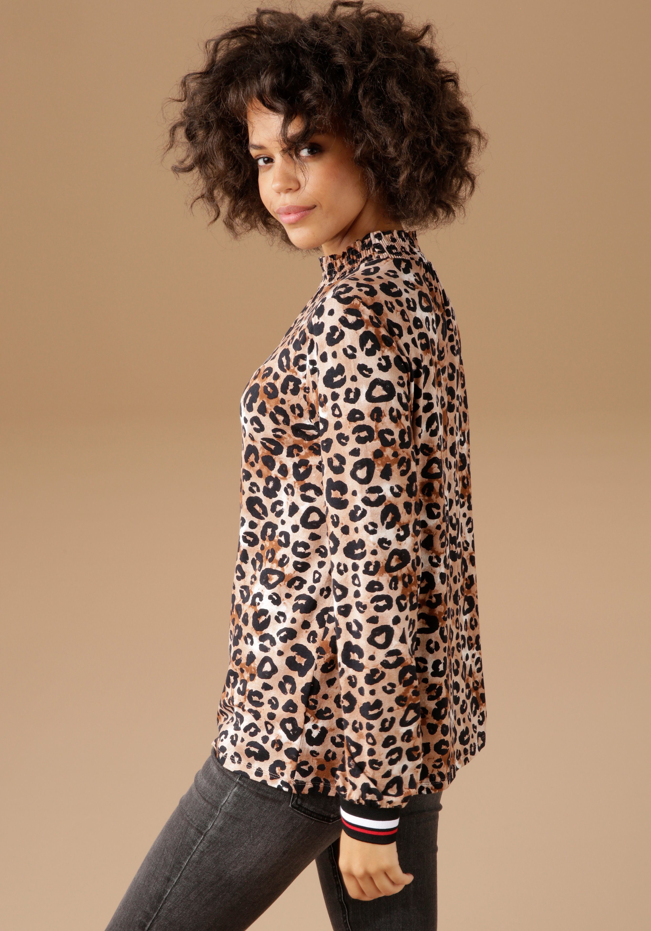 Aniston CASUAL Langarmshirt mit trendigem Animal-Print und gestreiften Bünd günstig online kaufen