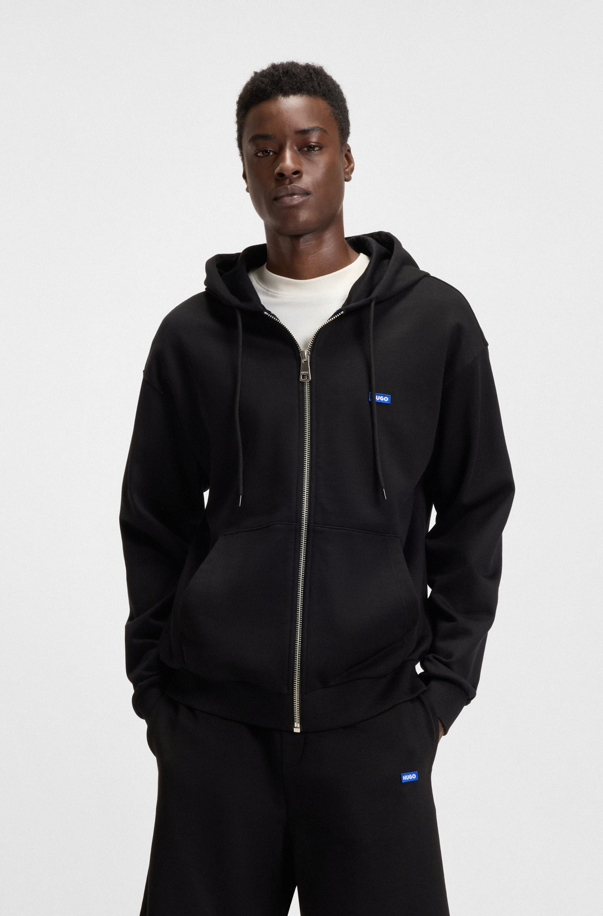 HUGO Kapuzensweatjacke Nadarasi mit Logo-Badge