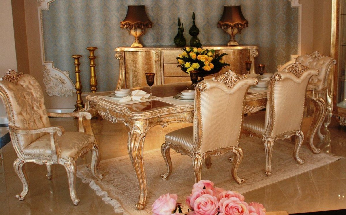 Casa Padrino Esszimmer-Set Luxus Barock Esszimmer Set Gold / Antik Gold - 1 Esszimmertisch & 6 Esszimmerstühle - Prunkvolle Barock Esszimmer Möbel