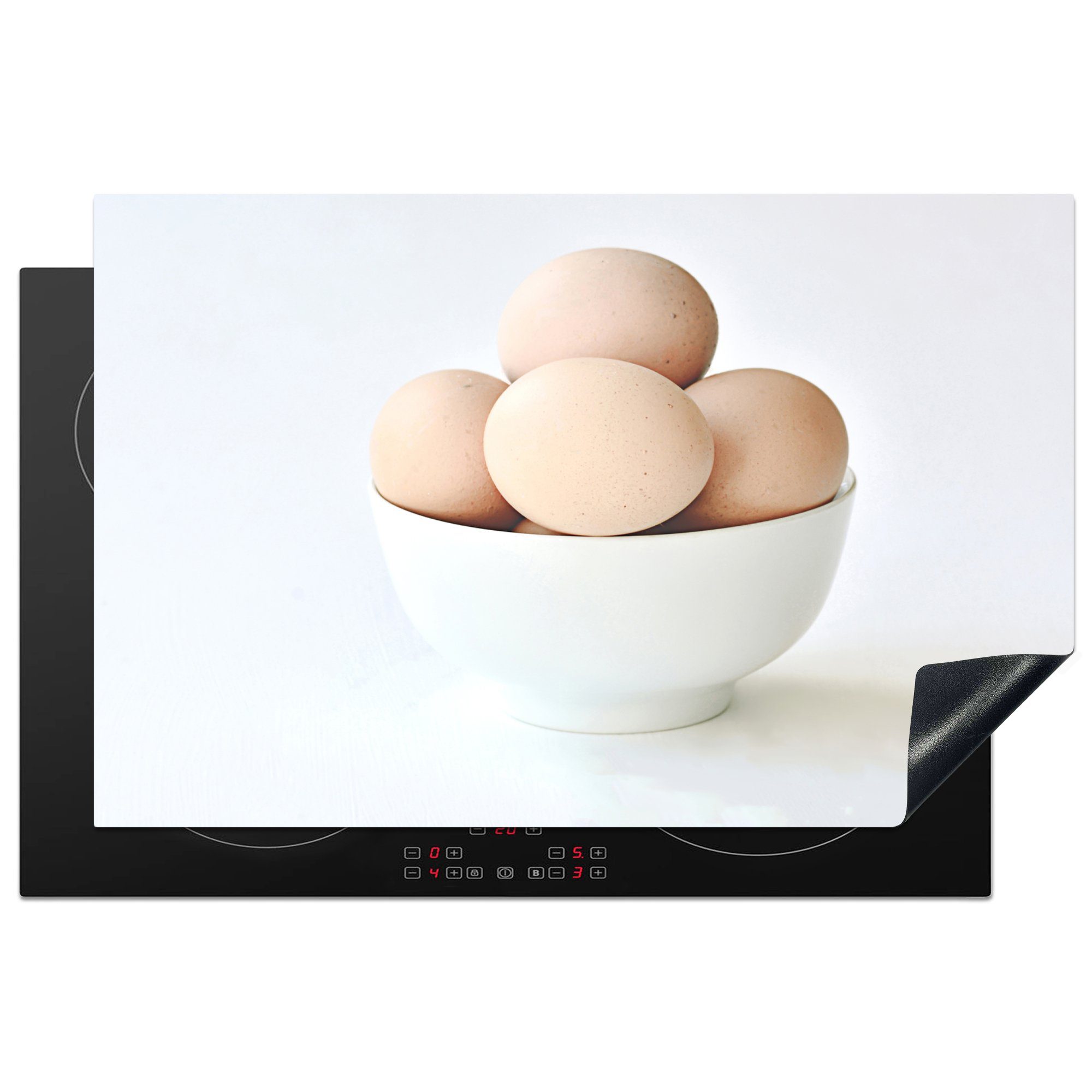 MuchoWow Herdblende-/Abdeckplatte Eier in einer Schüssel, Vinyl, (1 tlg), 81x52 cm, Induktionskochfeld Schutz für die küche, Ceranfeldabdeckung