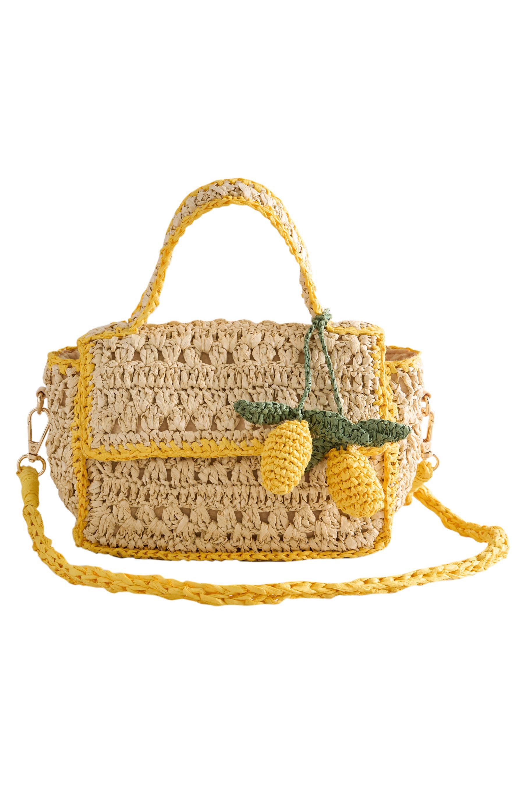 Next Umhängetasche Tasche in Raffiaoptik mit Zitronenanhänger (1-tlg)