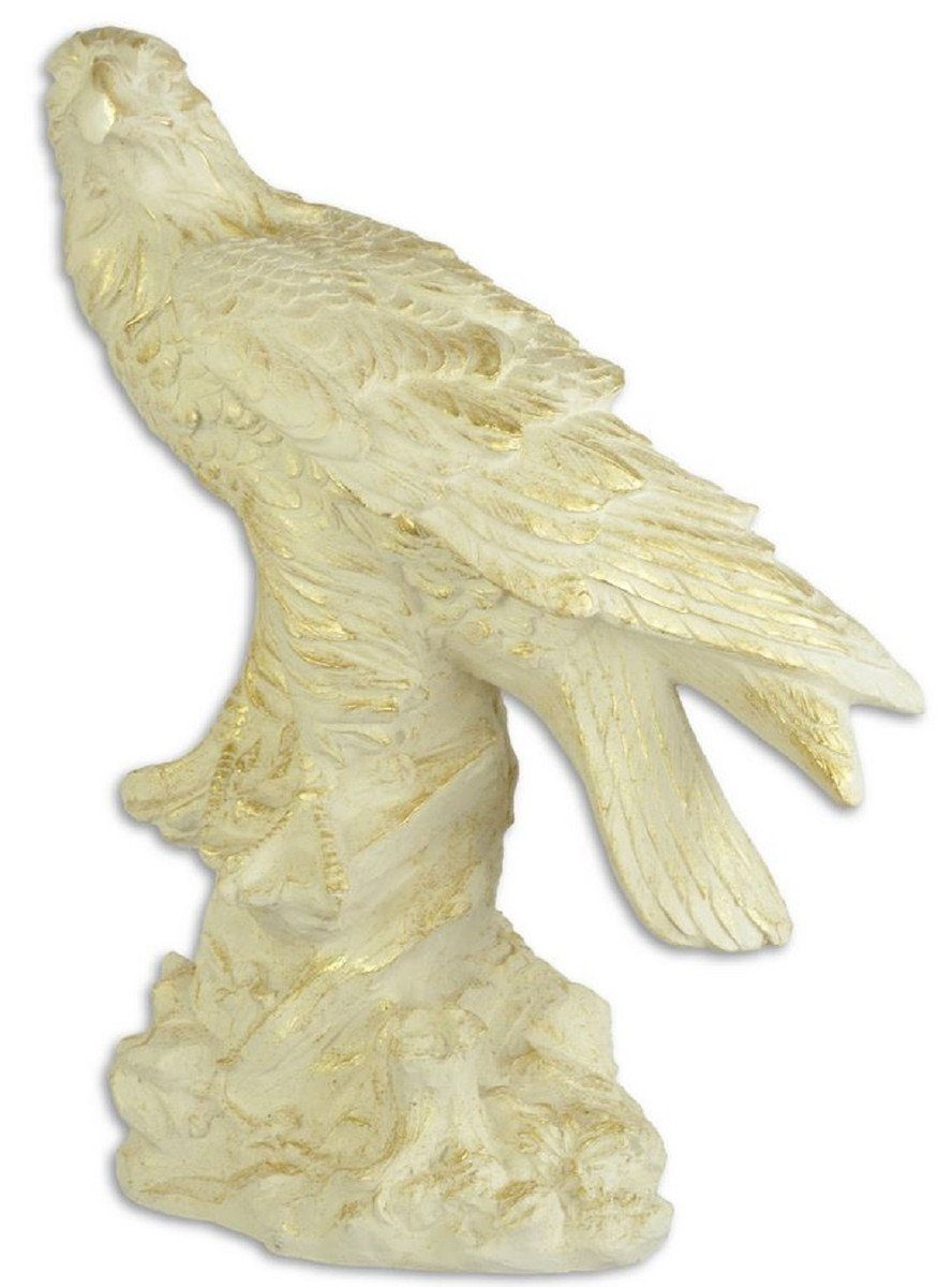 Casa Padrino Dekofigur Casa Padrino Deko Skulptur Adler Cremefarben / Gold 42,7 x 25,7 x H. 59 cm - Polyresin Dekofigur