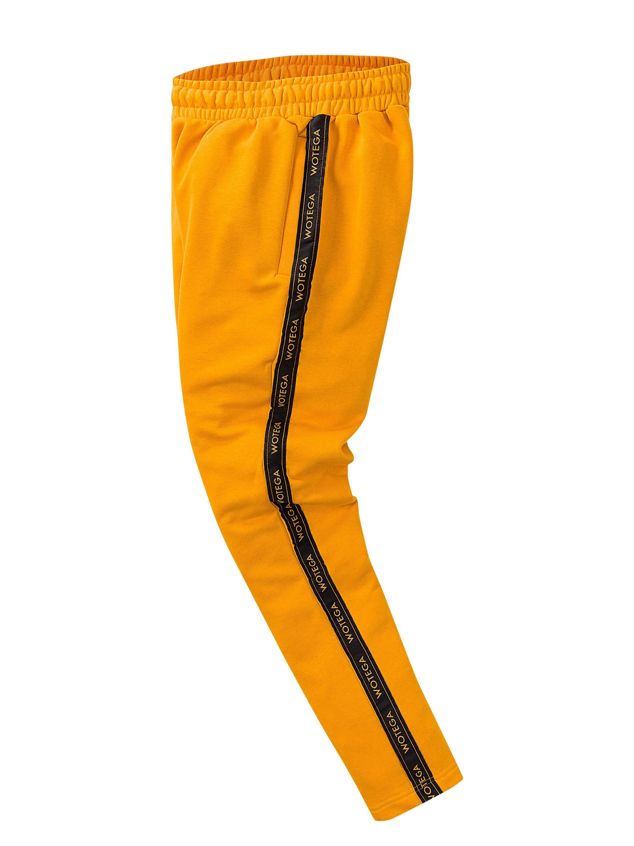 151054) WOTEGA yellow Kordelzug - Bund (1-tlg) elastischem, mit Track WOTEGA Pant mit (cadmium Valir Retro Jogginghose Gelb
