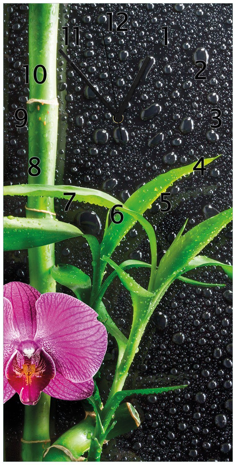 Wallario Wanduhr Bambus und pinke Orchidee auf schwarzem Glas mit Regentropfen (Uhr aus Acryl)