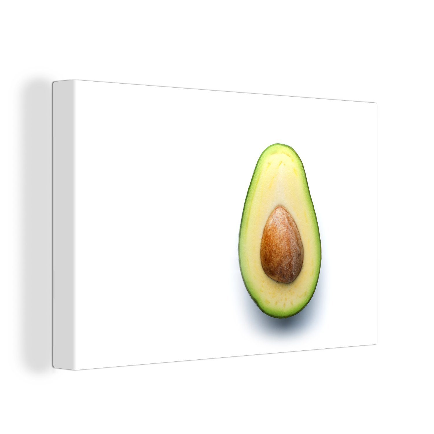 OneMillionCanvasses® Leinwandbild Avocado in Scheiben geschnitten mit Stein, (1 St), Wandbild Leinwandbilder, Aufhängefertig, Wanddeko, 30x20 cm