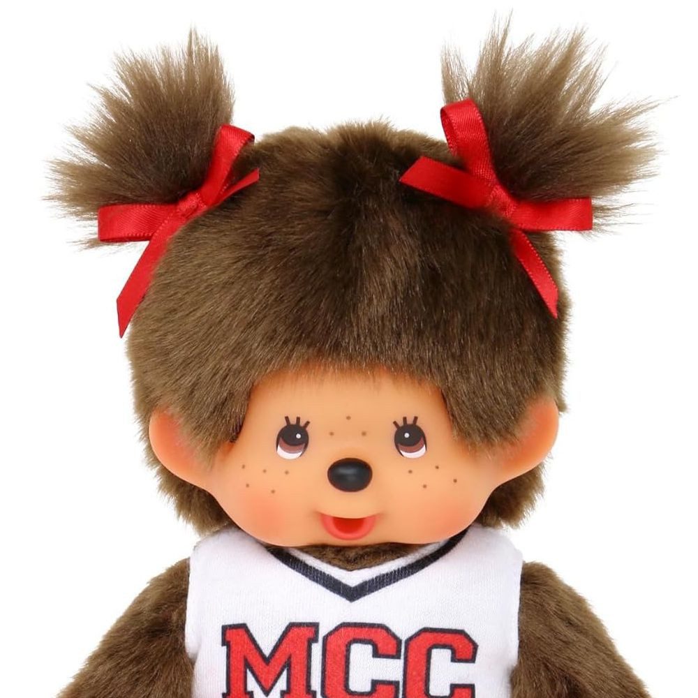 Monchhichi Plüschfigur Mädchen im Cheerleader-Kleid 20 cm Monchhichi Puppe zwei Zöpfchen
