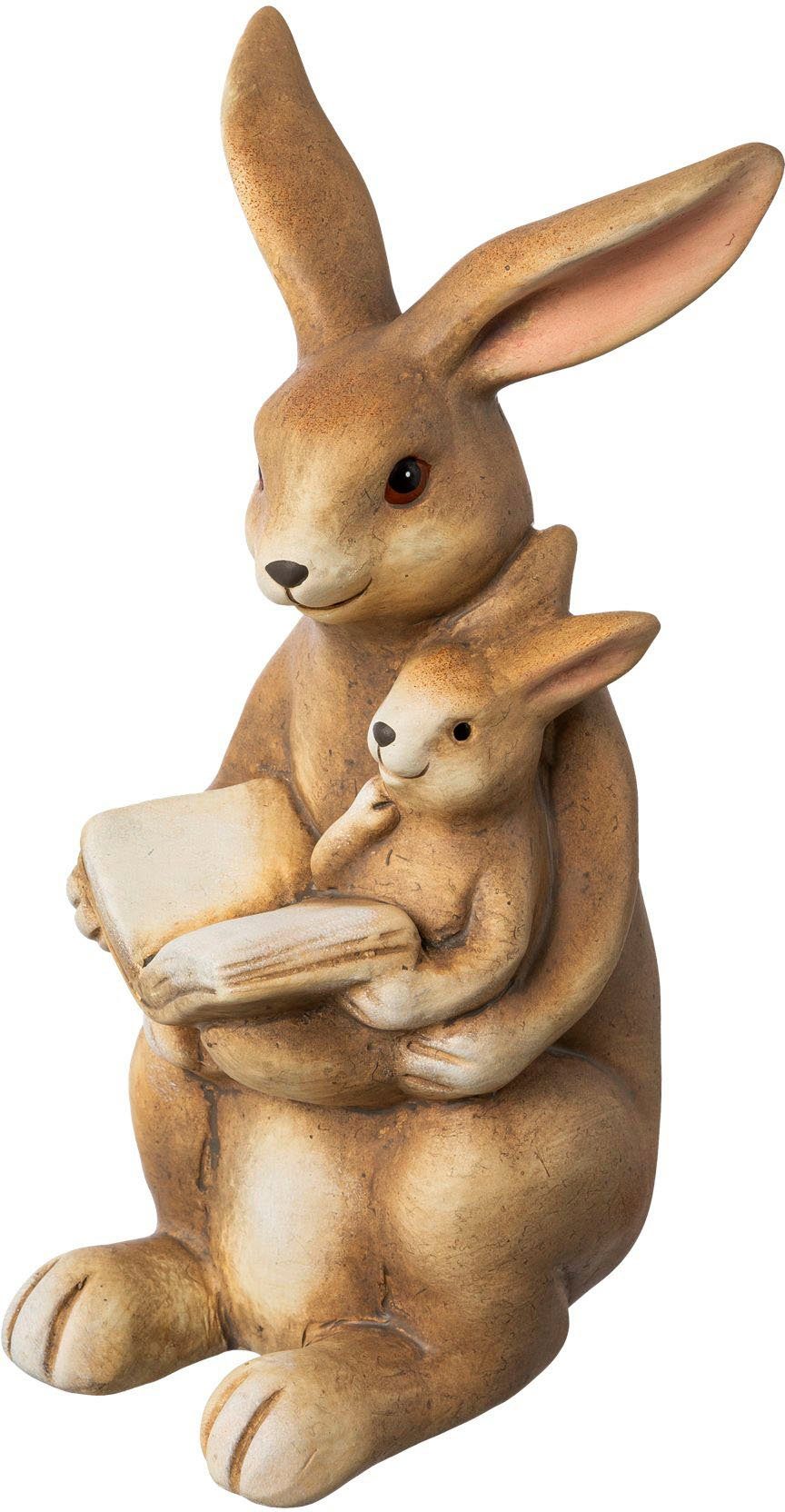 Osterhase Osterdeko mit fröhlichem Gesicht