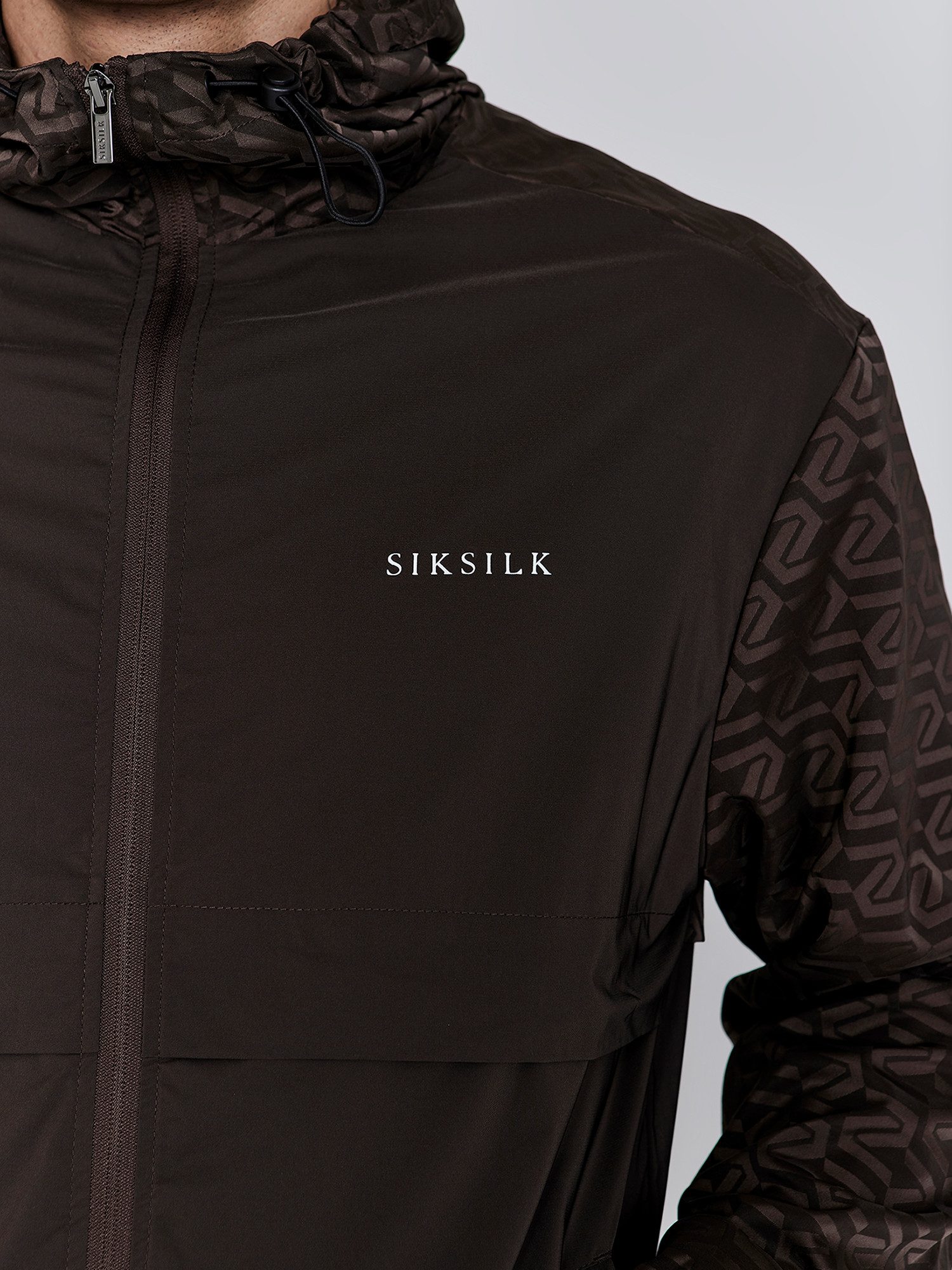 Siksilk Windbreaker SikSilk Herren Braunes AOP Windjacke