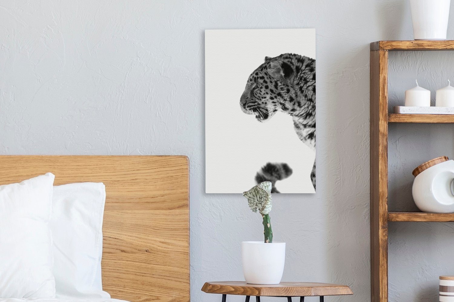 OneMillionCanvasses® Leinwandbild Leopard im Schnee inkl. St), bunt fertig bespannt (1 - und schwarz Zackenaufhänger, Gemälde, cm Leinwandbild 20x30 weiß