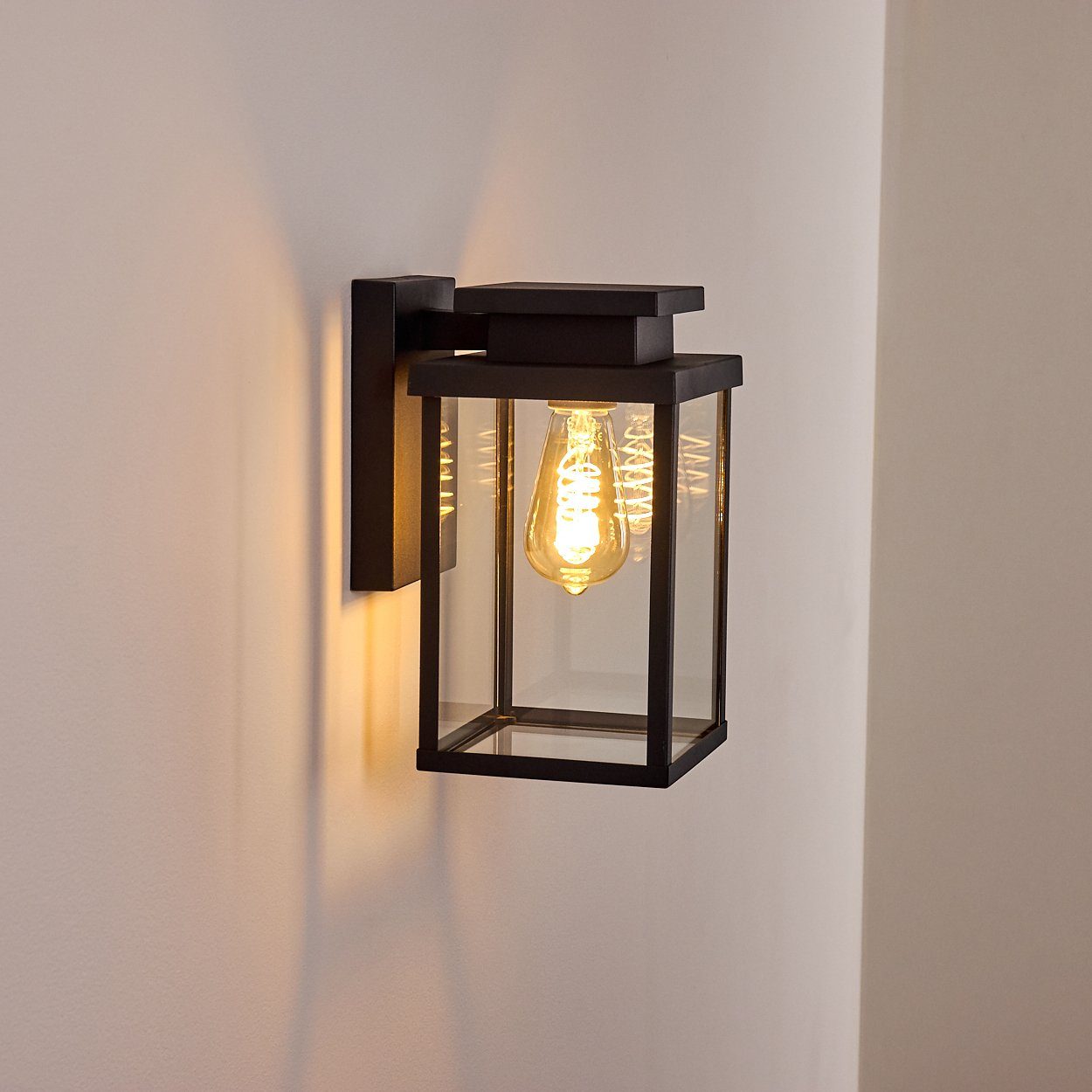 hofstein Außen-Wandleuchte »Poggio« Wandaußenleuchte moderne Wandlampe aus Metall/Glas in schwarz, ohne Leuchtmittel, E27, Außenleuchte abwärts mit Lichteffekt für den Eingangsbereich