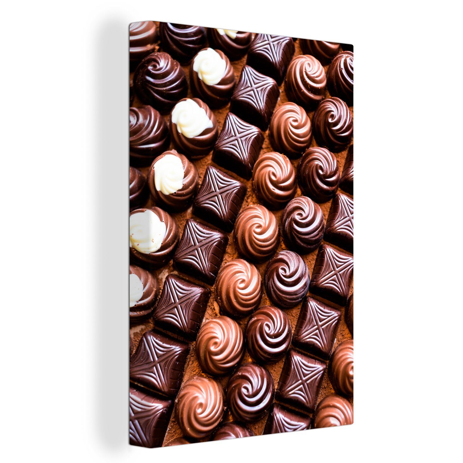 OneMillionCanvasses® Leinwandbild Bonbons in einer Reihe im Kakaopulver, (1 St), Leinwandbild fertig bespannt inkl. Zackenaufhänger, Gemälde, 20x30 cm