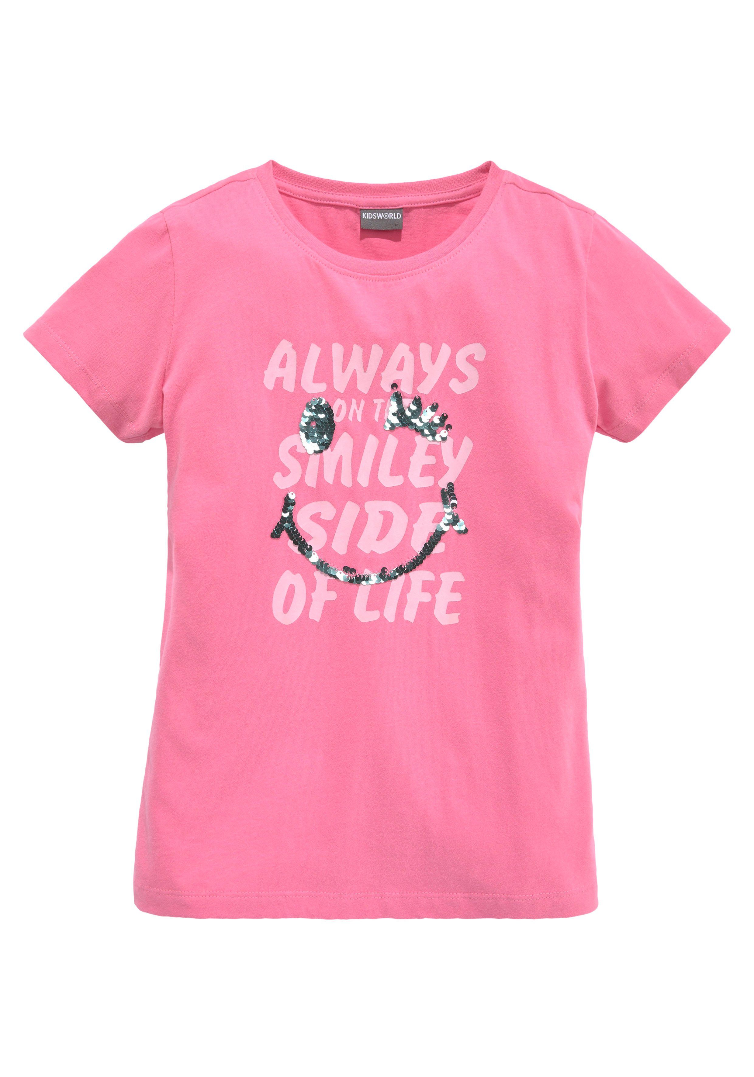 KIDSWORLD T-Shirt mit Wendepailletten Kurzarm, Basic-Passform, mit Pailletten, bedruckt. Reduzierter Preis € 10,49. Unverbindliche Preisempfehlung € 14,99, (€ 10,49 pro 1 Stk)