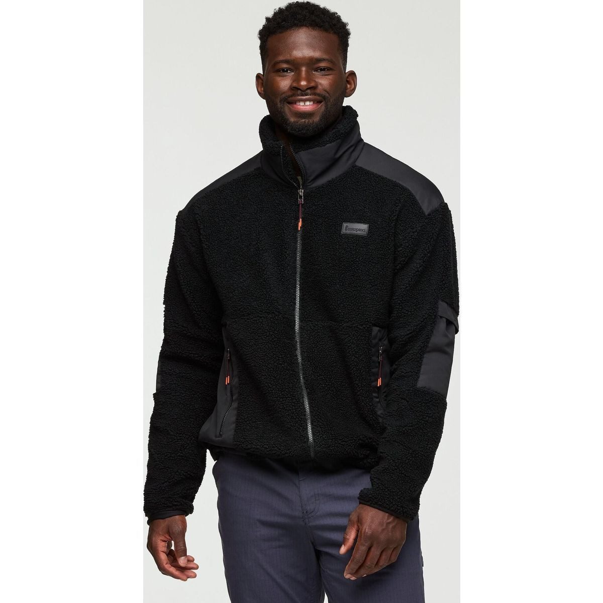 Cotopaxi Fleecejacke Bacano Fleece Jacket Cotopaxi Black Men Kuschelig warme Fleecejacke mit funktionalen Taschen und stilvollem