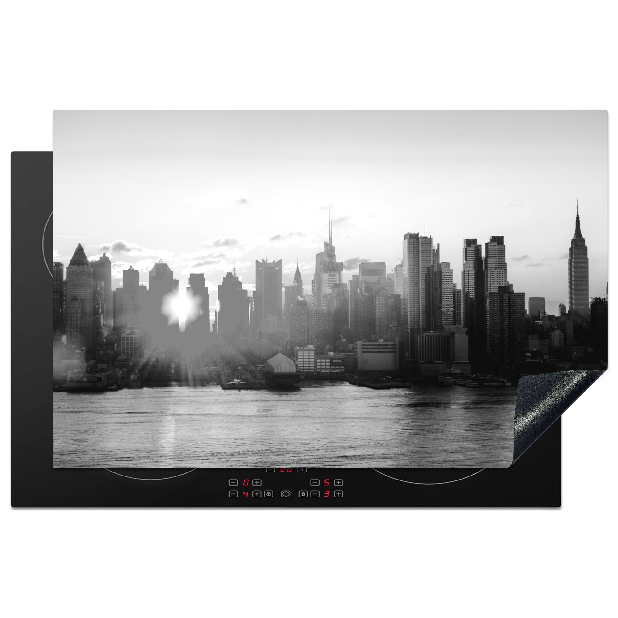 MuchoWow Herdblende-/Abdeckplatte Die Skyline von New York bei Sonnenaufgang - schwarz und weiß, Vinyl, (1 tlg), 81x52 cm, Induktionskochfeld Schutz für die küche, Ceranfeldabdeckung