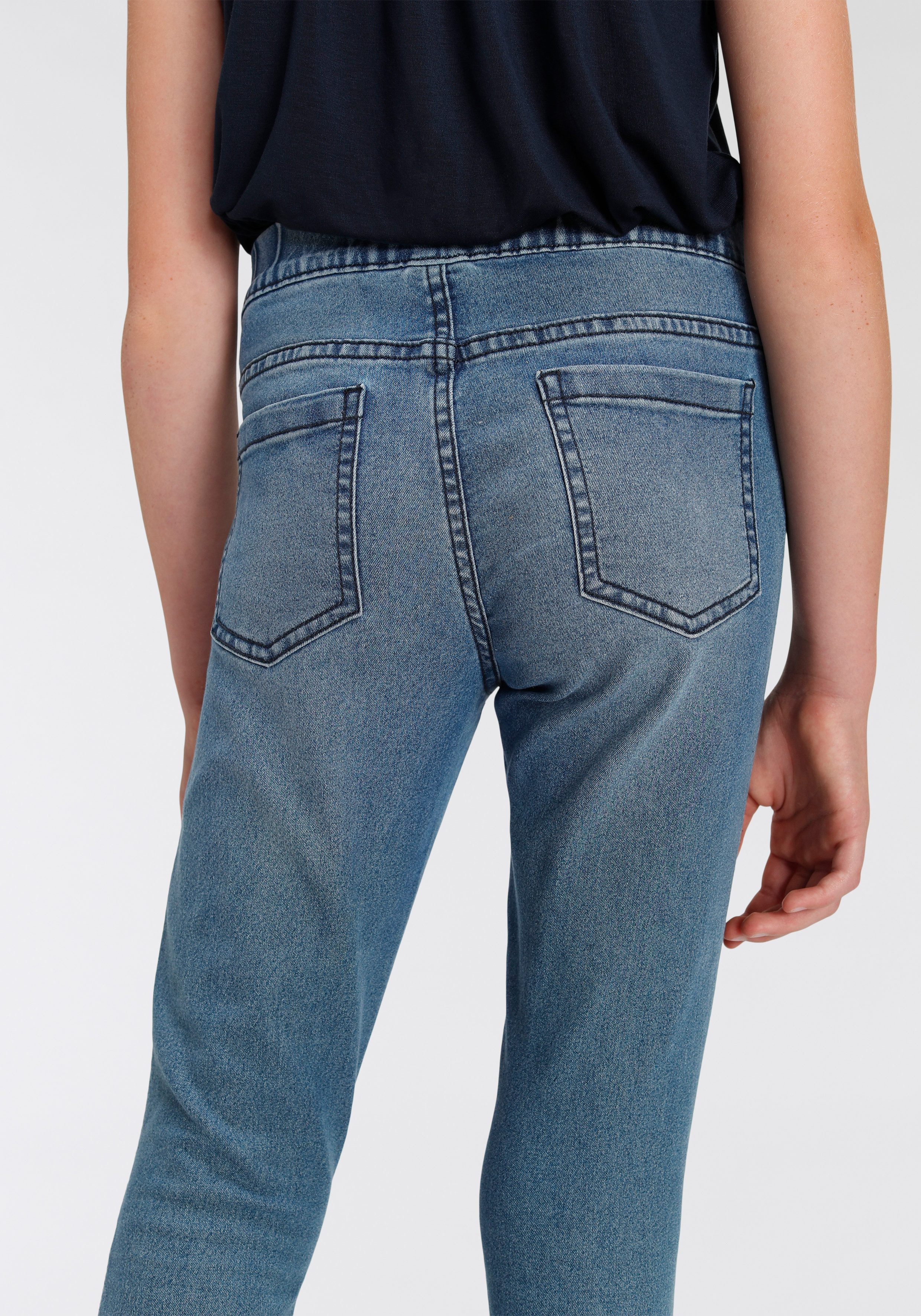 KIDSWORLD Jeansjeggings, Stetch-Jeans mit schmalem Bein schmale Beinform, mit Gummizug, lang, mit aufgesetzten Taschen