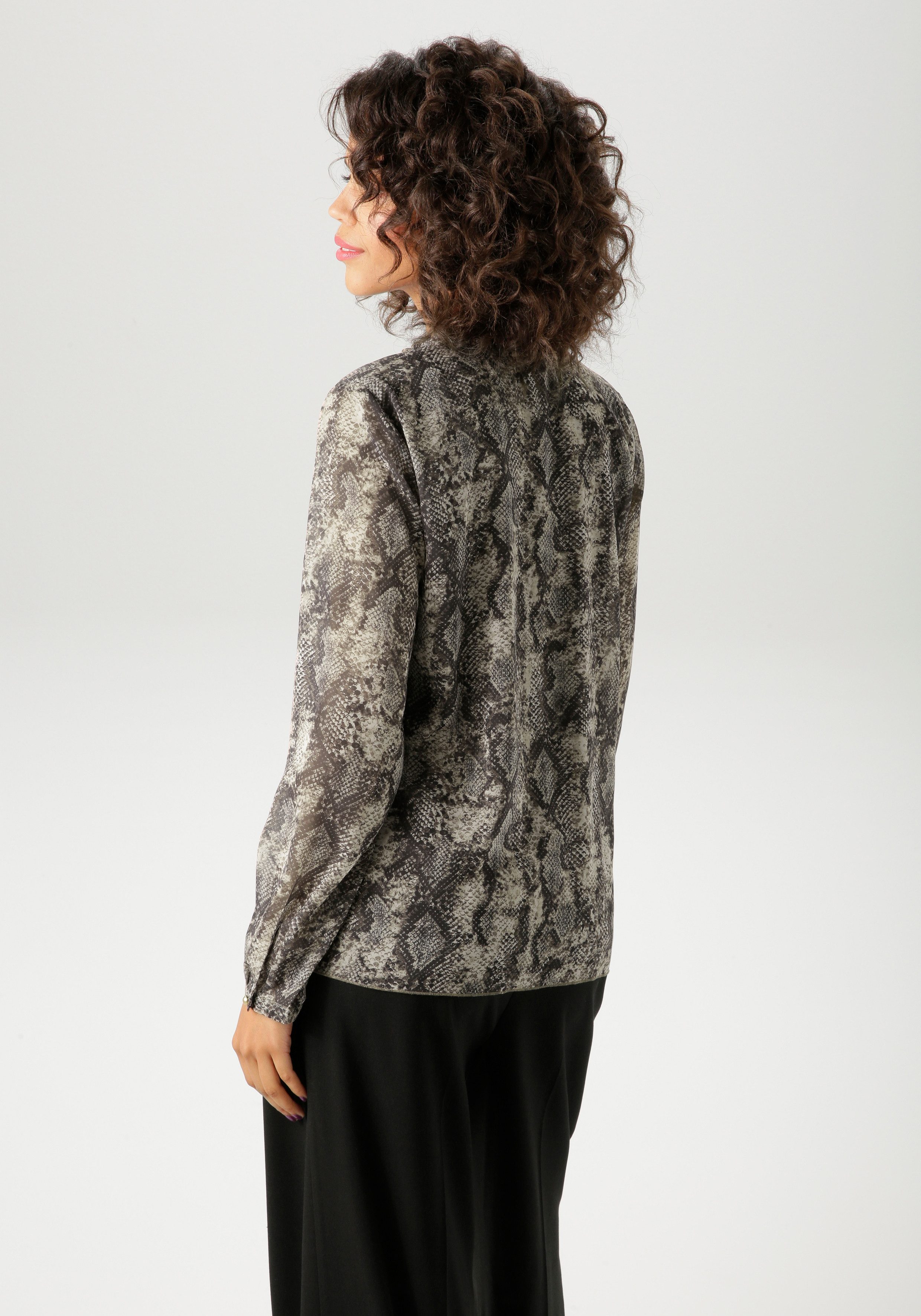 Aniston CASUAL Schlupfbluse mit trendigem Schlangendruck günstig online kaufen