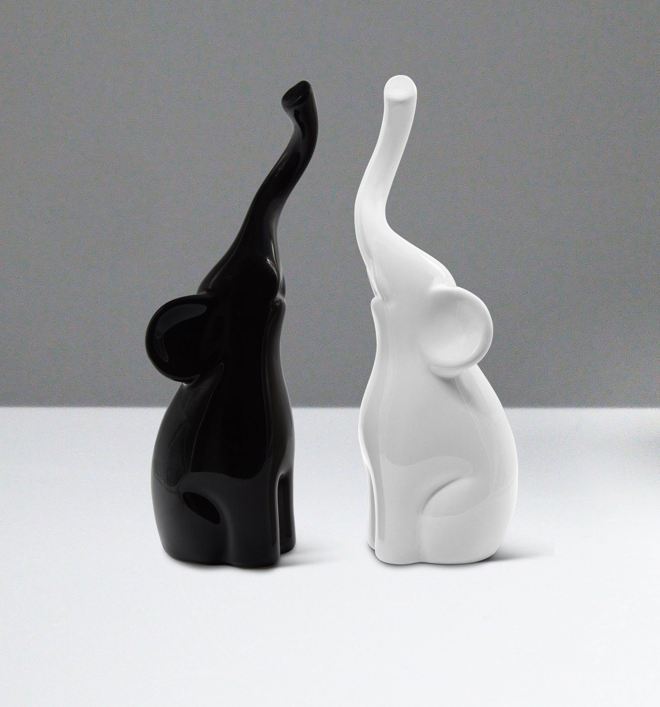 Feinknick Dekofigur Harmonisches Elefanten Pärchen aus Keramik in Schwarz & Weiß (Set, 2tlg), Moderne Skulptur als Paar aus zwei Elefanten - ideal als Geschenk