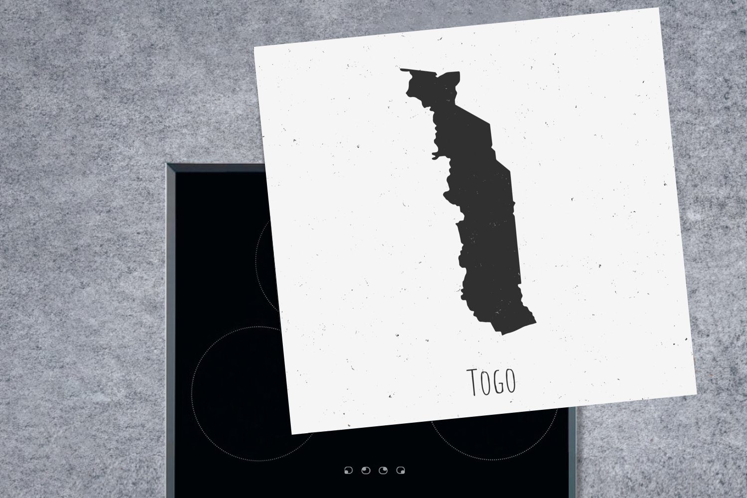 Eine MuchoWow Herdblende-/Abdeckplatte mit, Vinyl, cm, tlg), für (1 einem 78x78 küche schwarz-weiße Illustration Ceranfeldabdeckung, Hintergrund Togo Arbeitsplatte auf von