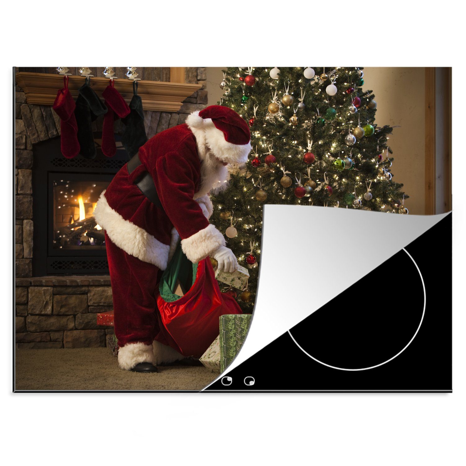 MuchoWow Herdblende-/Abdeckplatte Der Weihnachtsmann legt Geschenke unter den Baum, Vinyl, (1 tlg), 70x52 cm, Mobile Arbeitsfläche nutzbar, Ceranfeldabdeckung