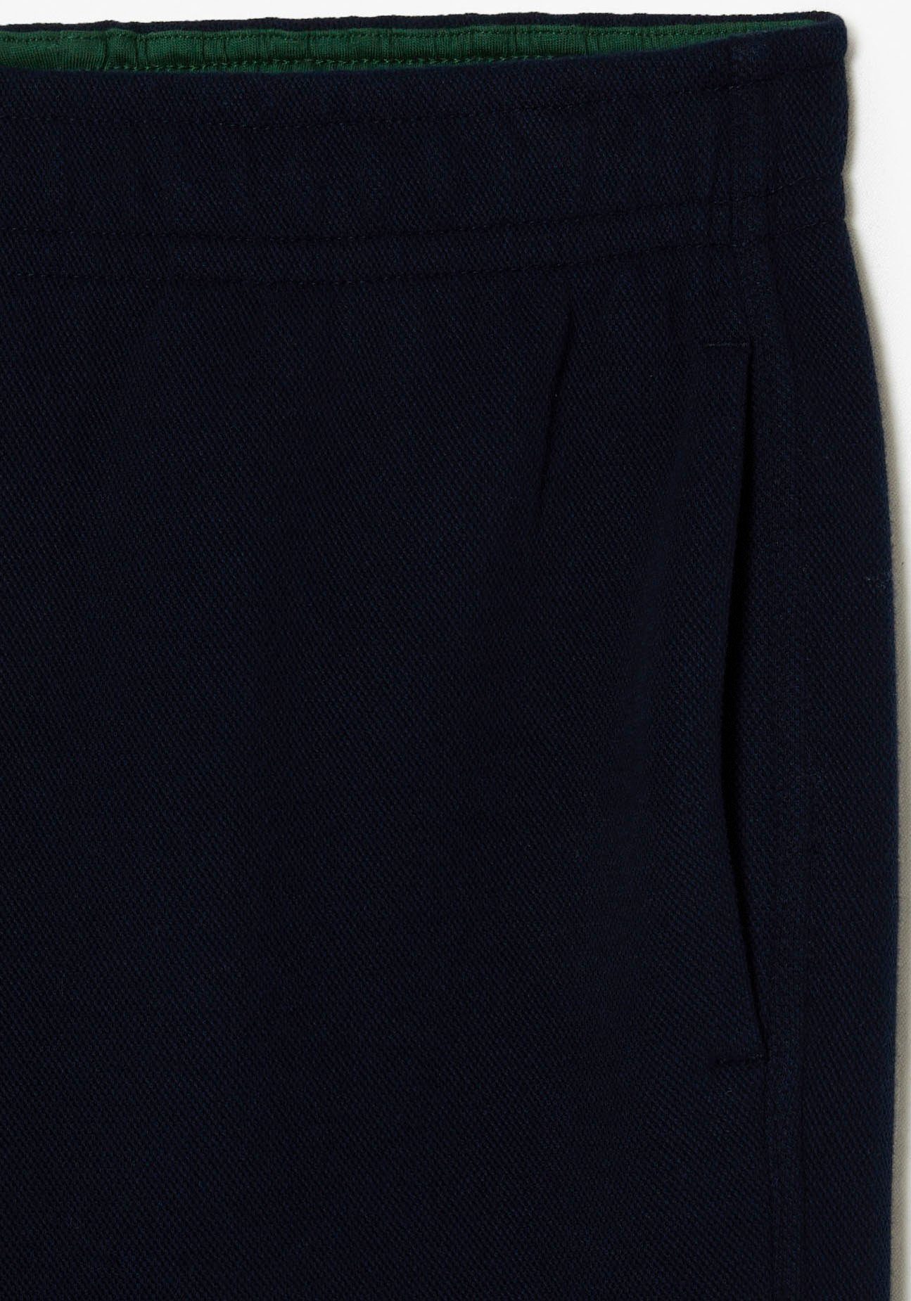 Wirkhose Lacoste Navy mit Markenlabel