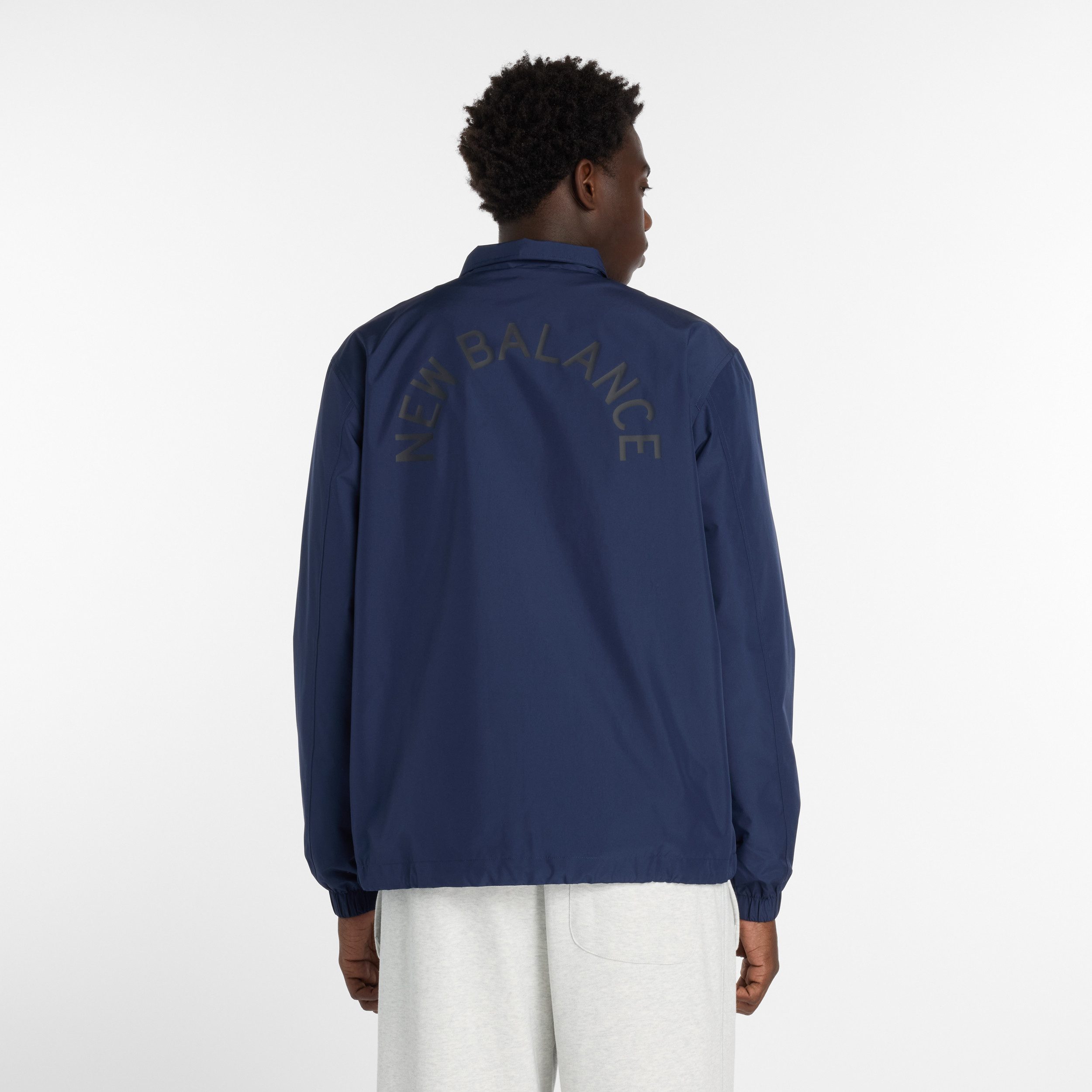 New Balance Kurzjacke TNV Mens Lifestyle Jacket sportlicher Stil, modernes Design, mit Grafikprint, Übergangsjacke