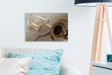 OneMillionCanvasses® Leinwandbild Trompete auf Notenpapier, (1 St), Wandbild Leinwandbilder, Aufhängefertig, Wanddeko, 30x20 cm