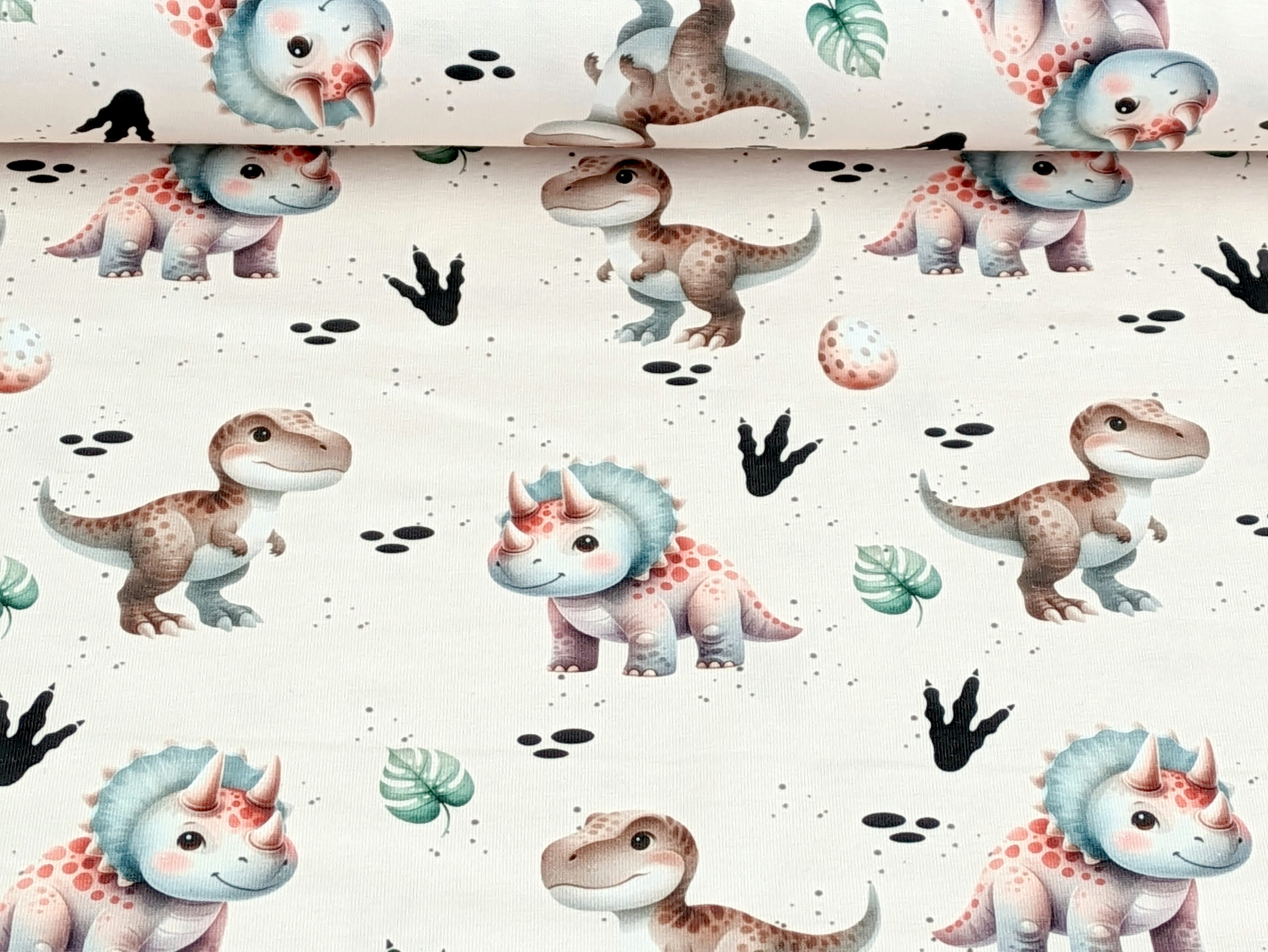 Corileo Stoff EP Bio Baumwolljersey Aquarell Kinder Dinos auf Beige Stoff