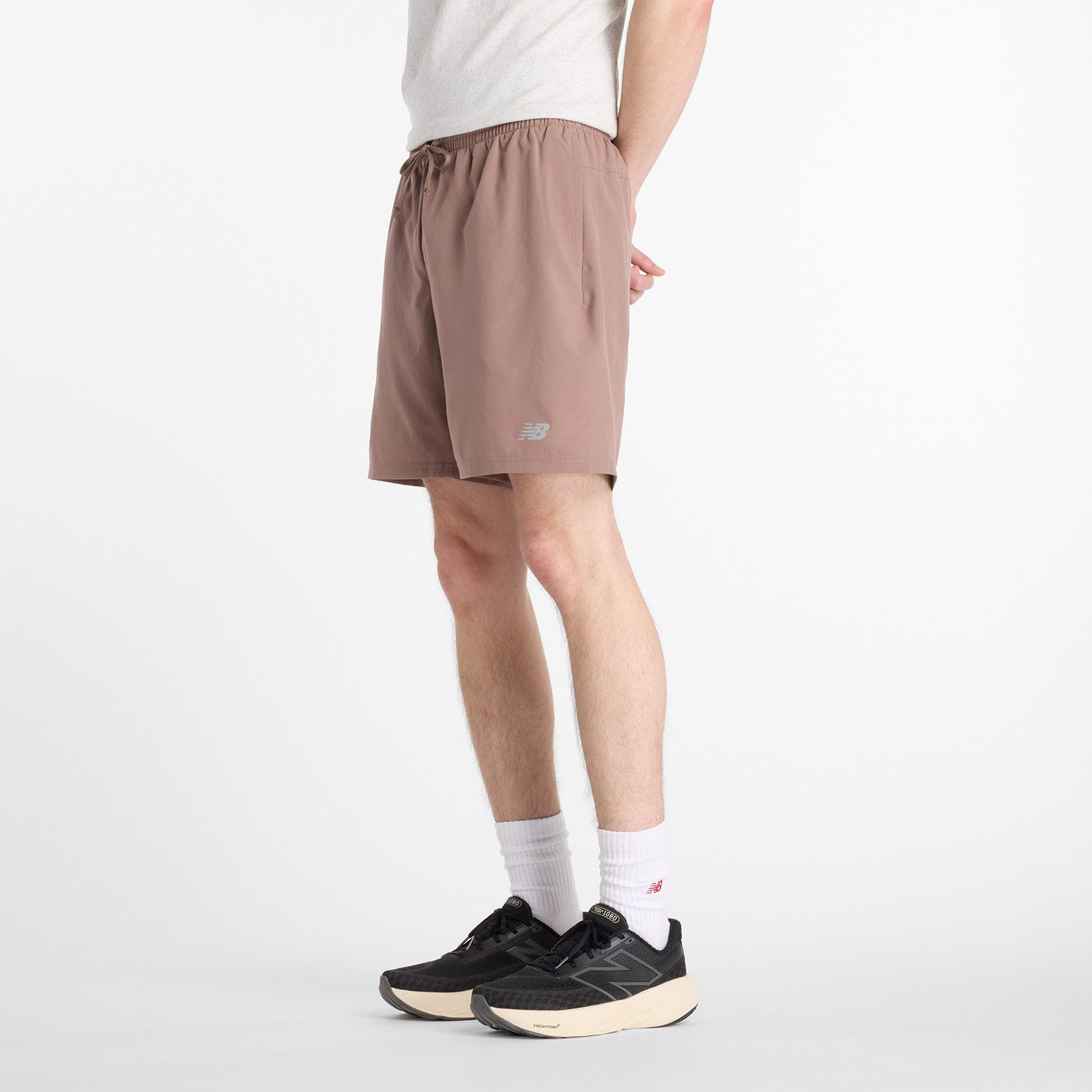 New Balance Laufshorts SPORT ESSENTIAL SHORT 7 mit feuchtigkeitsabweisender Technologie, atmungsaktiver Innenslip