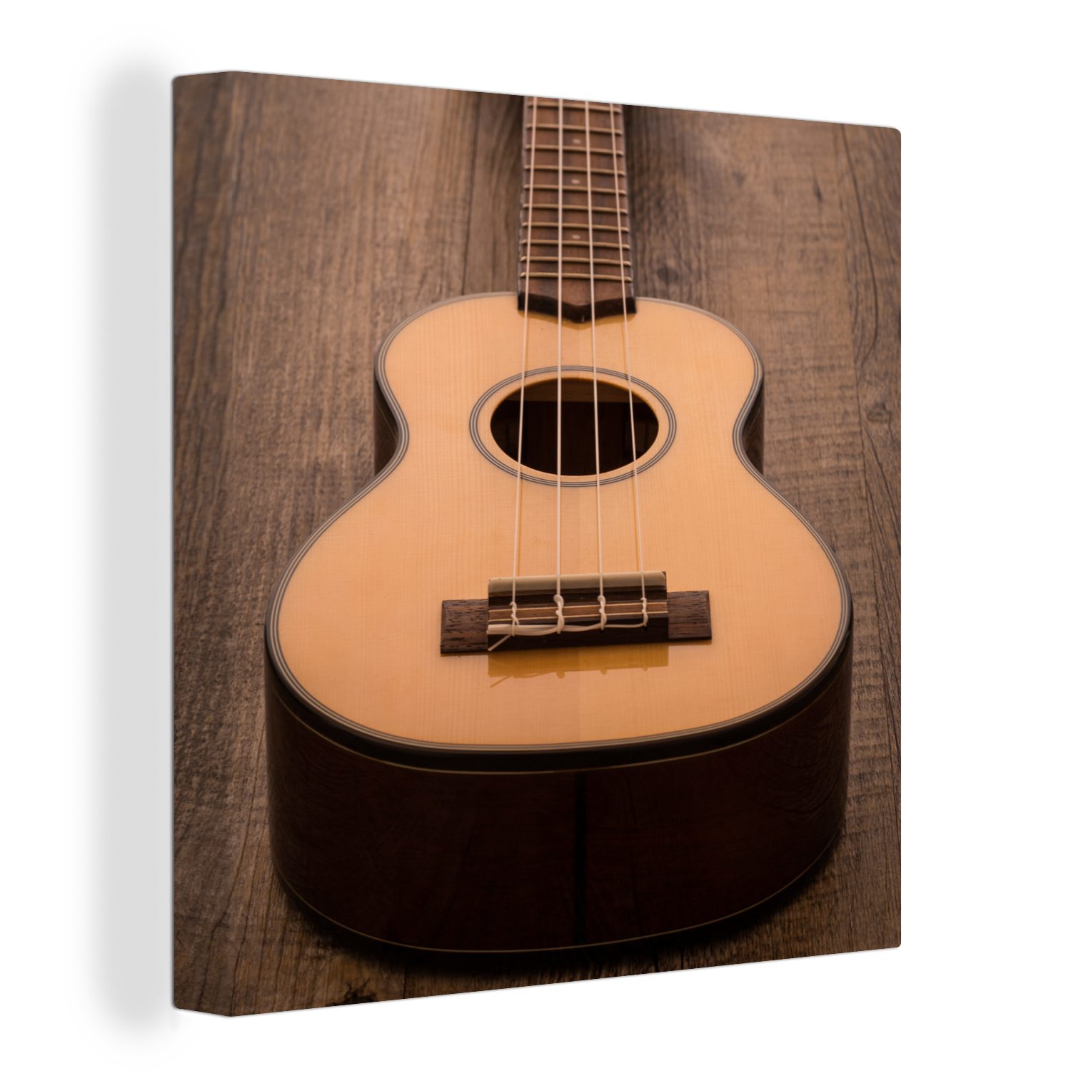 OneMillionCanvasses® Leinwandbild Akustische Gitarre auf einem Holztisch, (1 St), Leinwand Bilder für Wohnzimmer Schlafzimmer