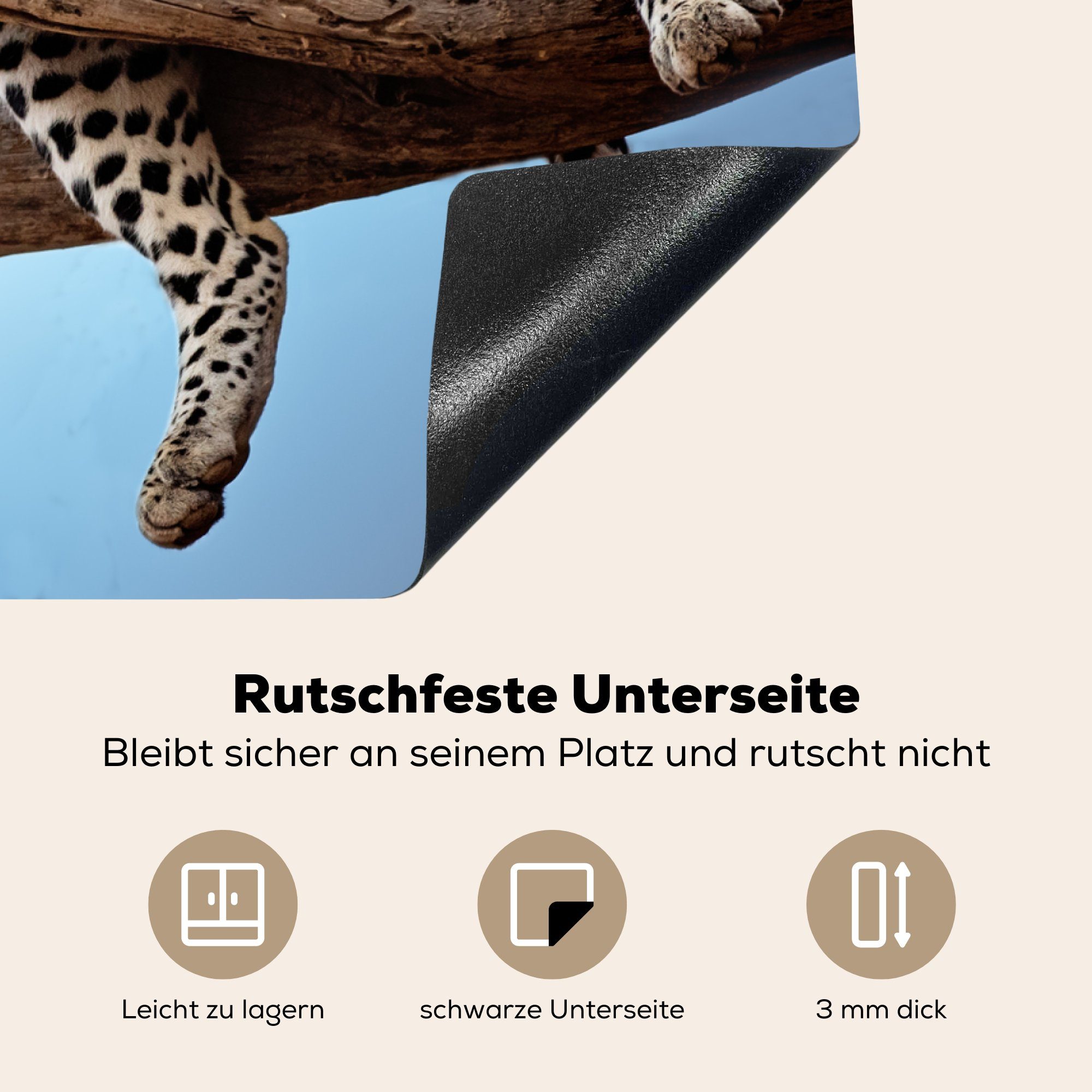 70x52 Vinyl, tlg), Herdblende-/Abdeckplatte MuchoWow Ceranfeldabdeckung nutzbar, dem Leopard cm, (1 Baum, auf Mobile Arbeitsfläche