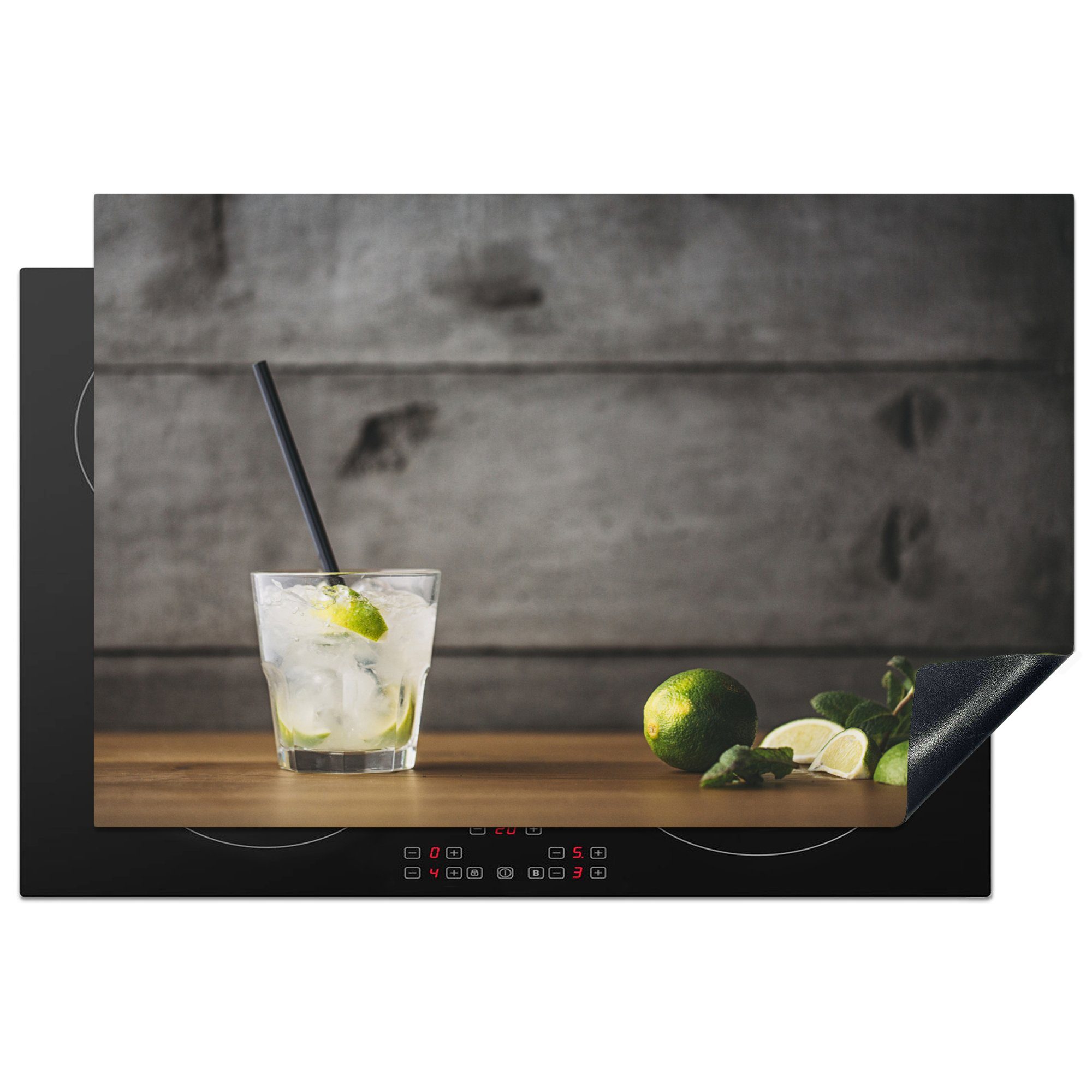 MuchoWow Herdblende-/Abdeckplatte Mojito-Cocktail mit Limette und Minze auf einem hölzernen Hintergrund, Vinyl, (1 tlg), 81x52 cm, Induktionskochfeld Schutz für die küche, Ceranfeldabdeckung