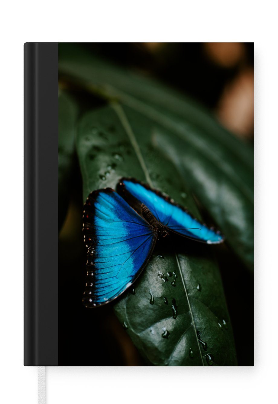 MuchoWow Notizbuch Abstrakte Darstellung eines blauen Schmetterlings auf einem grünen, Journal, Merkzettel, Tagebuch, Notizheft, A5, 98 Seiten, Haushaltsbuch