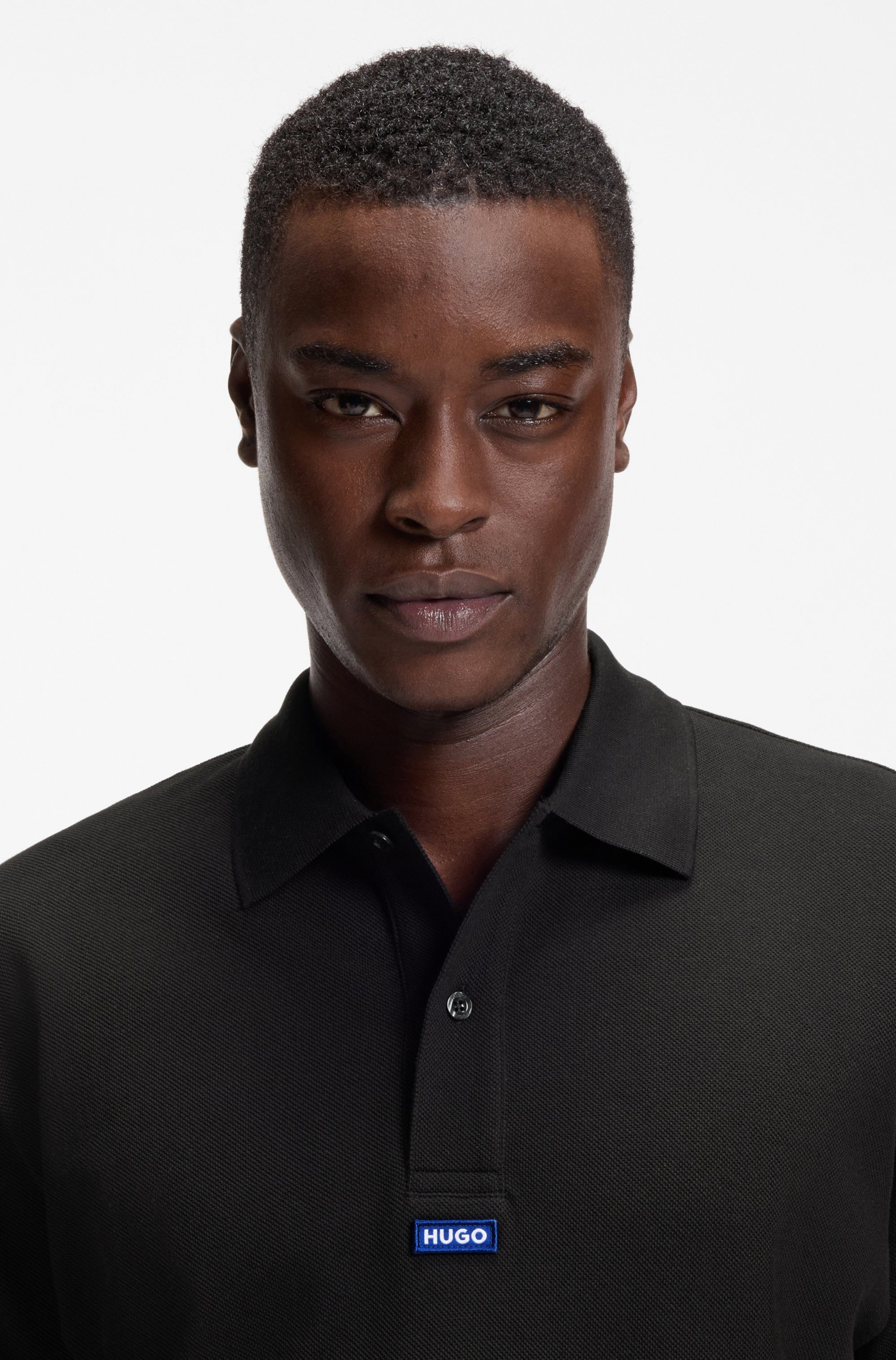 HUGO Poloshirt Nolitos Polokragen, Loose Fit, reine Baumwolle