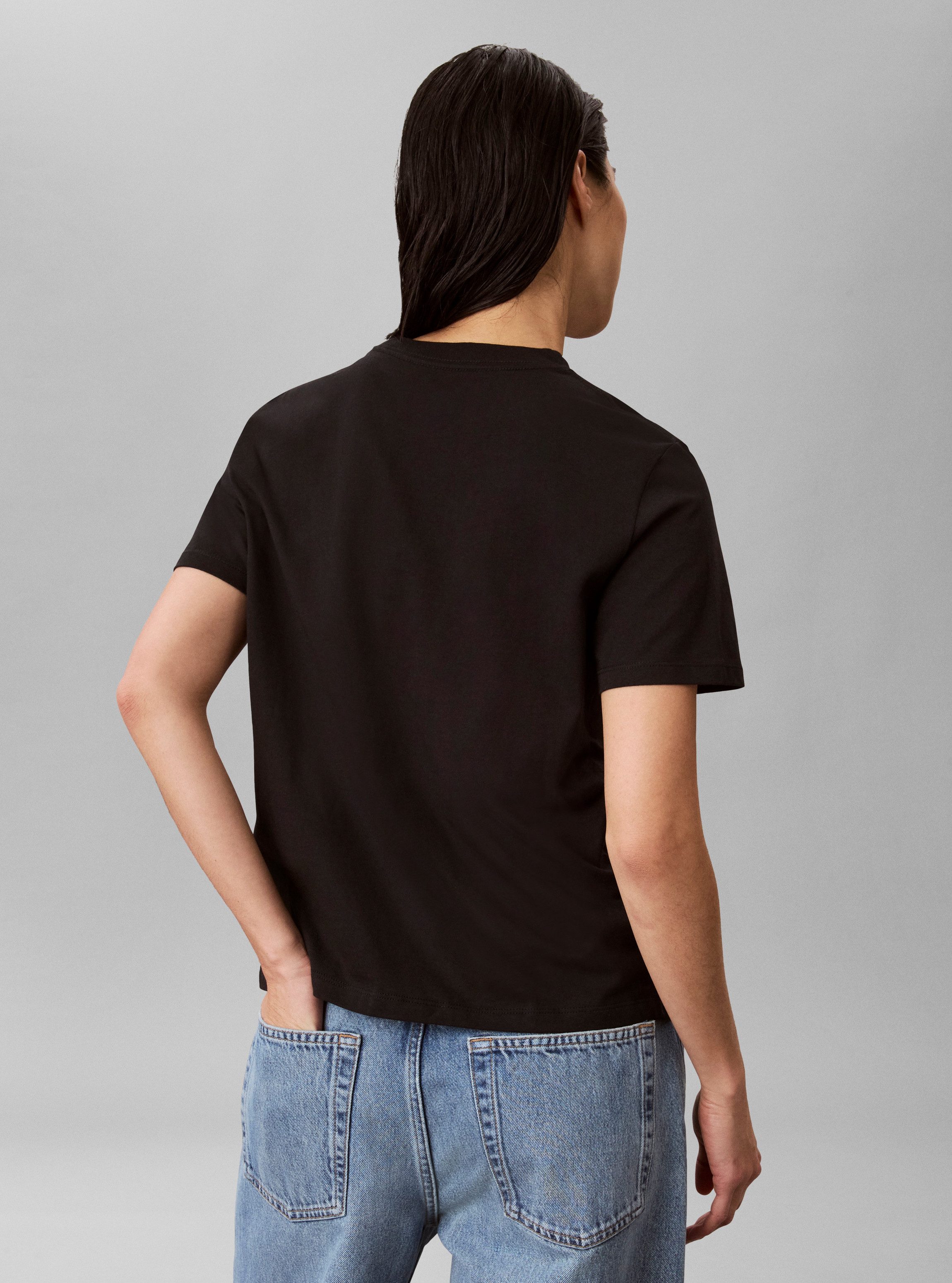 Calvin Klein Jeans T-Shirt Rundhalsausschnitt, Regular Fit, Logoschriftzug – Bild 3 von 5