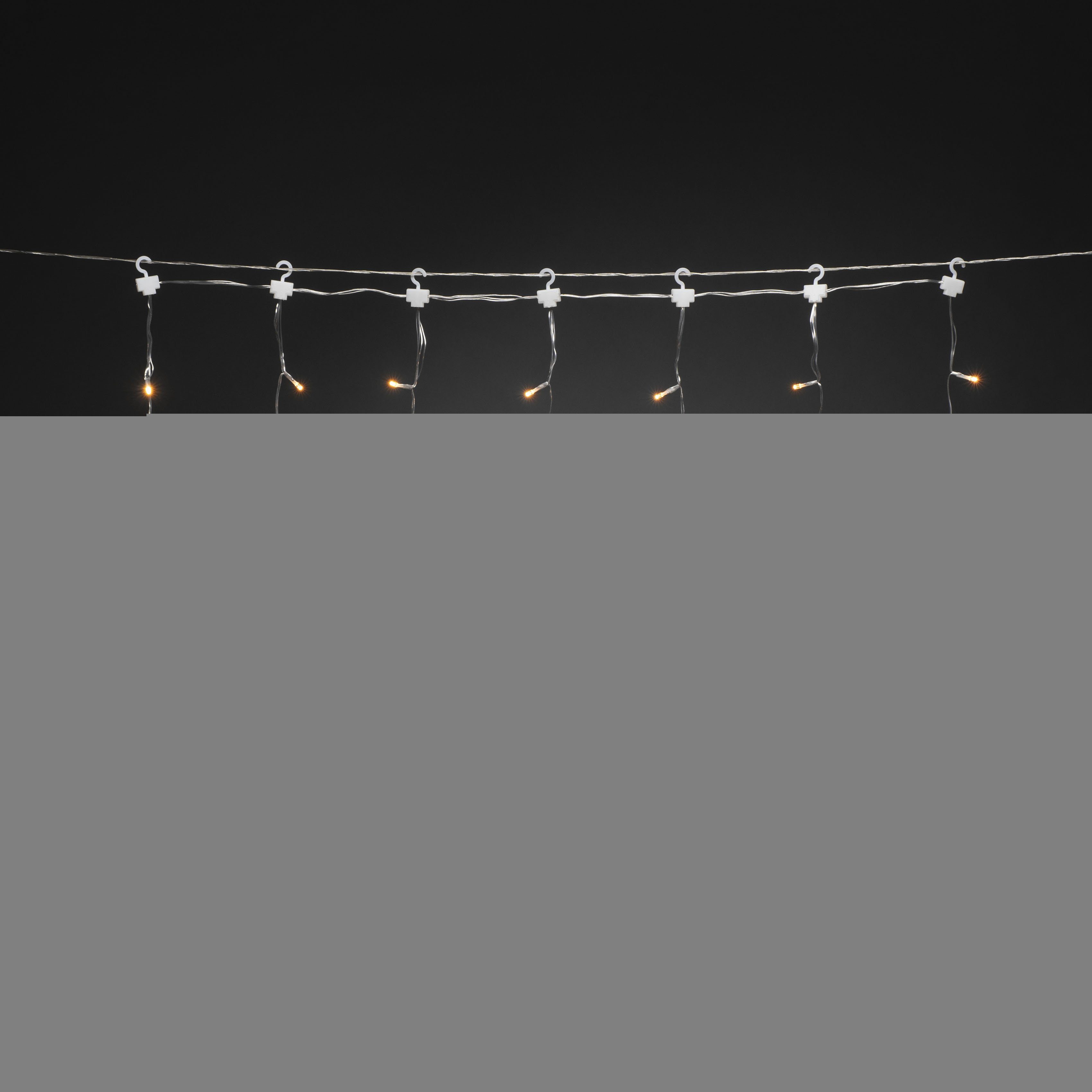 KONSTSMIDE LED-Lichtervorhang, 77-flammig, 3 kleine Multifunktion, bernsteinfb. 4 für und Außenbereich 77 große Sterne, Trafobetriebener den Artikel mit Dioden