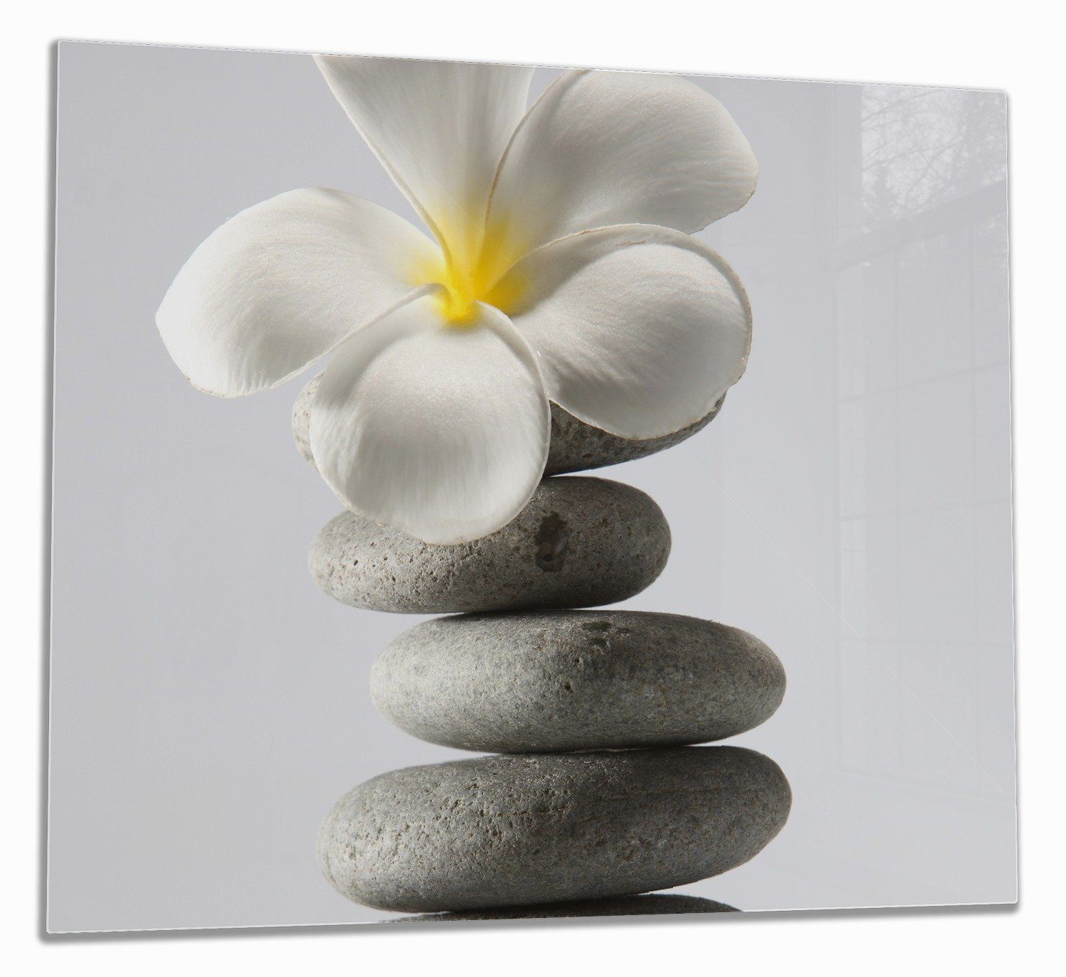 Wallario Herd-Abdeckplatte Blume auf gestapelten Steinen, ESG-Sicherheitsglas, (Glasplatte, 1 tlg., inkl. 5mm Noppen), verschiedene Größen