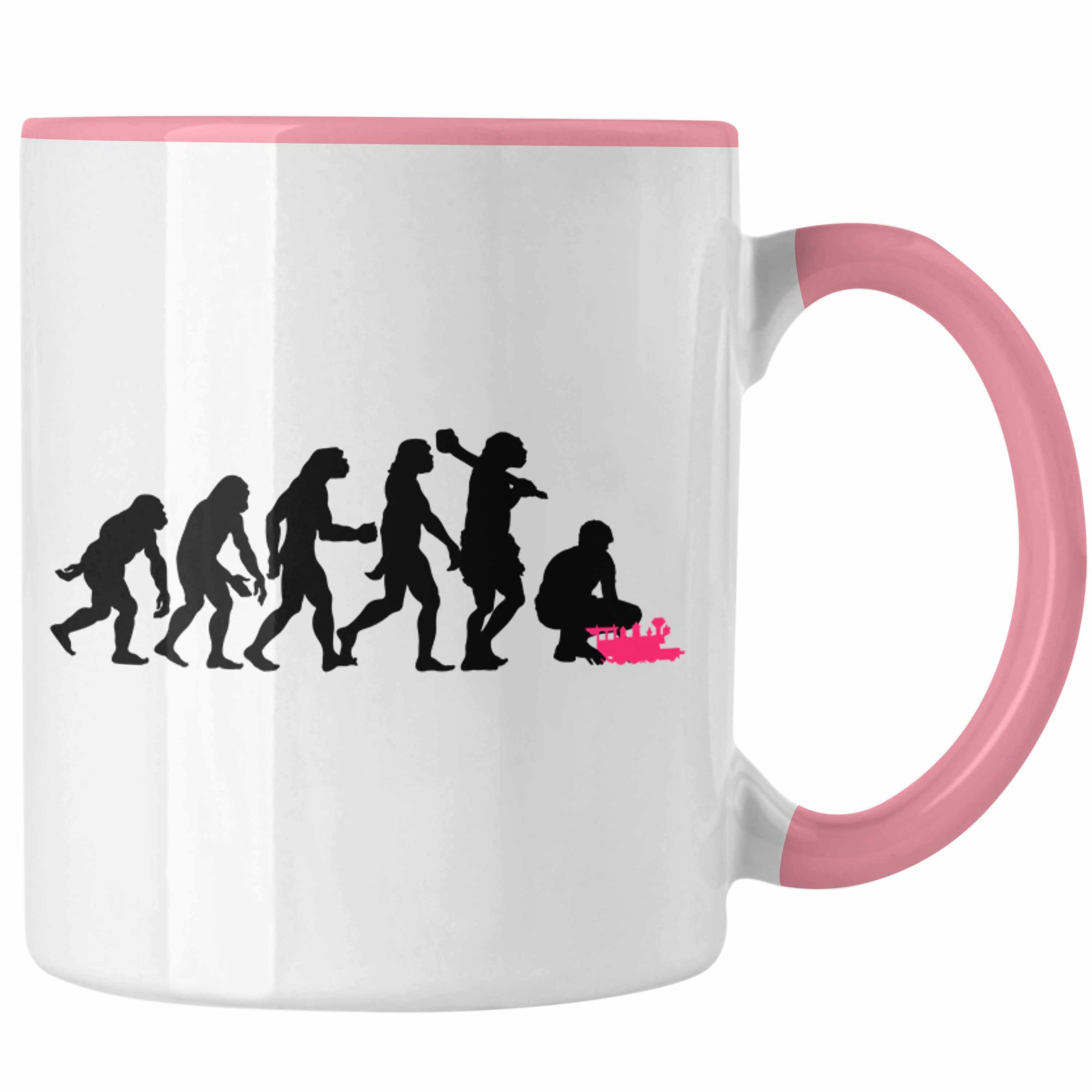 Trendation Tasse Trendation - Modeleisenbahn Geschenk Tasse Spruch Geschenk Geschenkidee Opa Rentner Dampflokomotive Eisenbahn Herzschlag Rosa