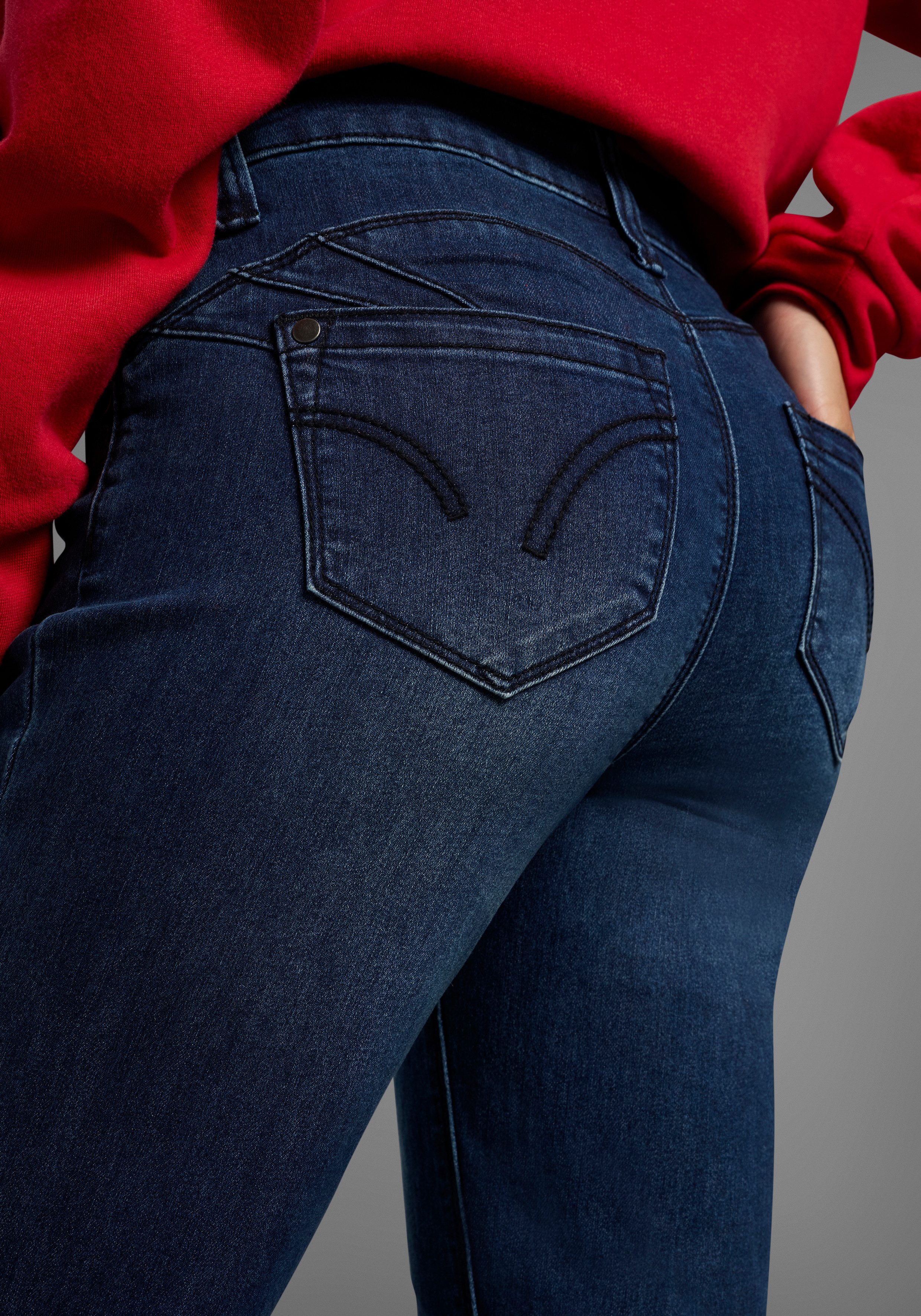 Arizona Bootcut-Jeans Shaping bootcut, Kontrastnähte, Used-Look-Waschung, niedrige Leibhöhe