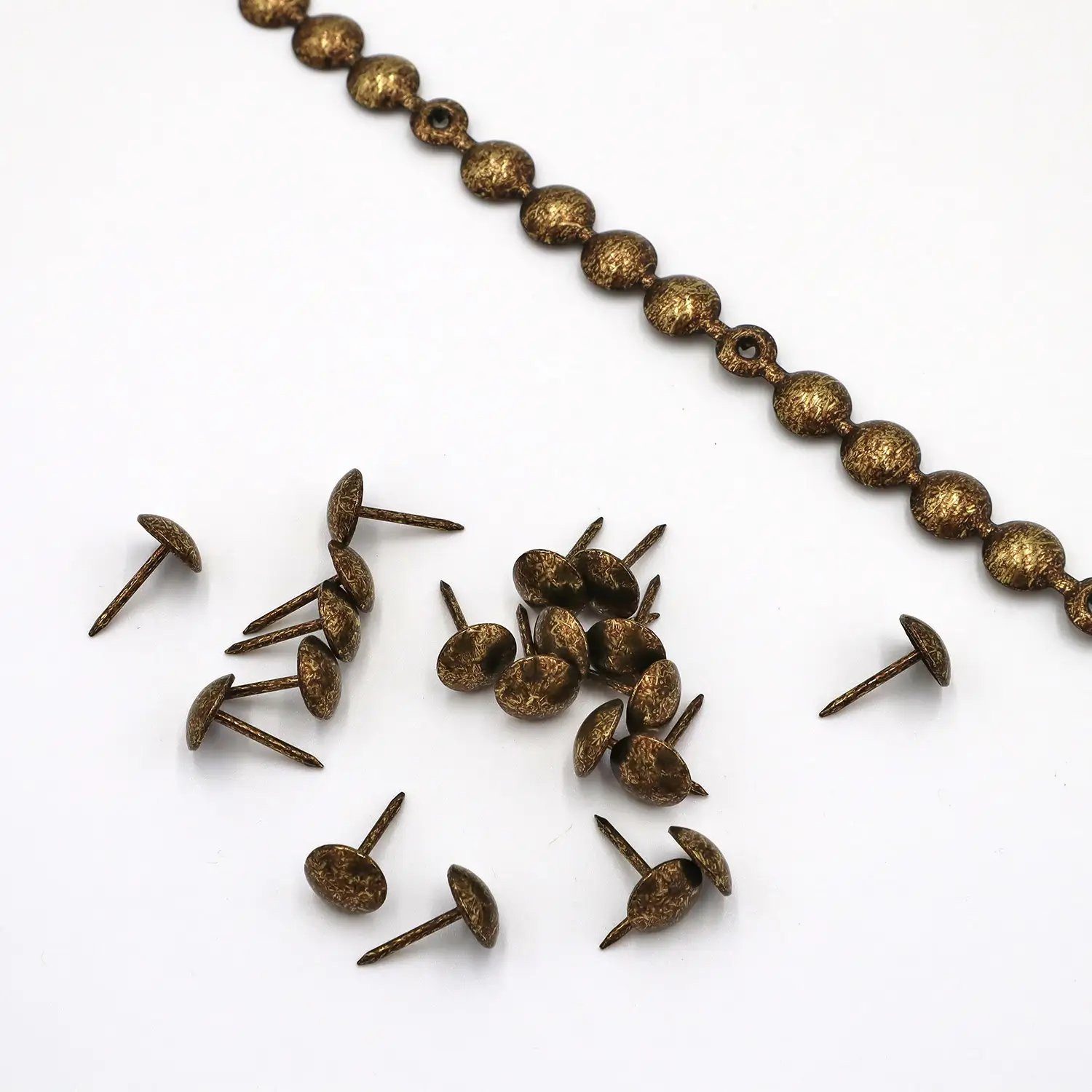 Stofferia Stoff Ziernagel-Streifen 1 Meter altgold gefleckt, Meterware