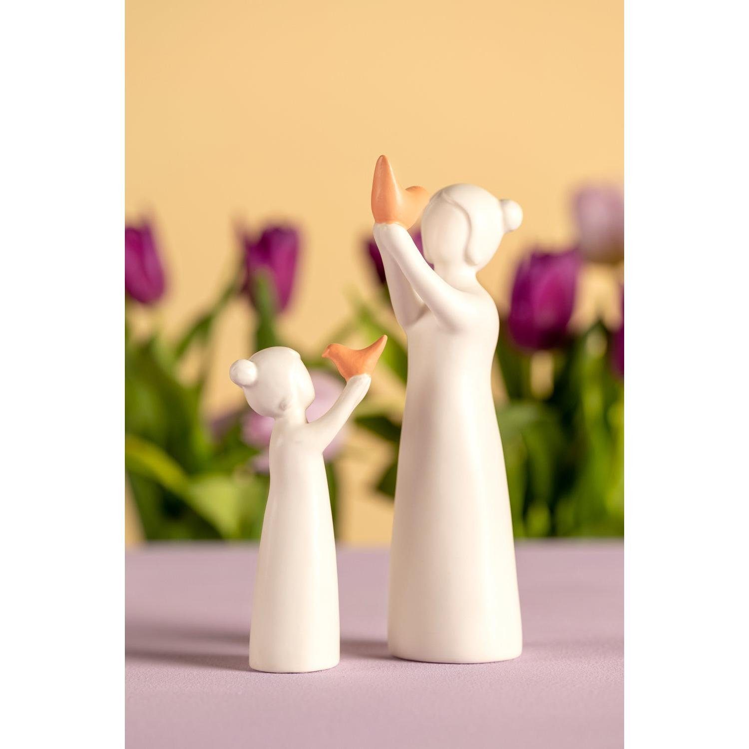 LEONARDO Dekoobjekt LEONARDO Keramikfigur Luminosa Mädchen Vogel Weiß (13cm)