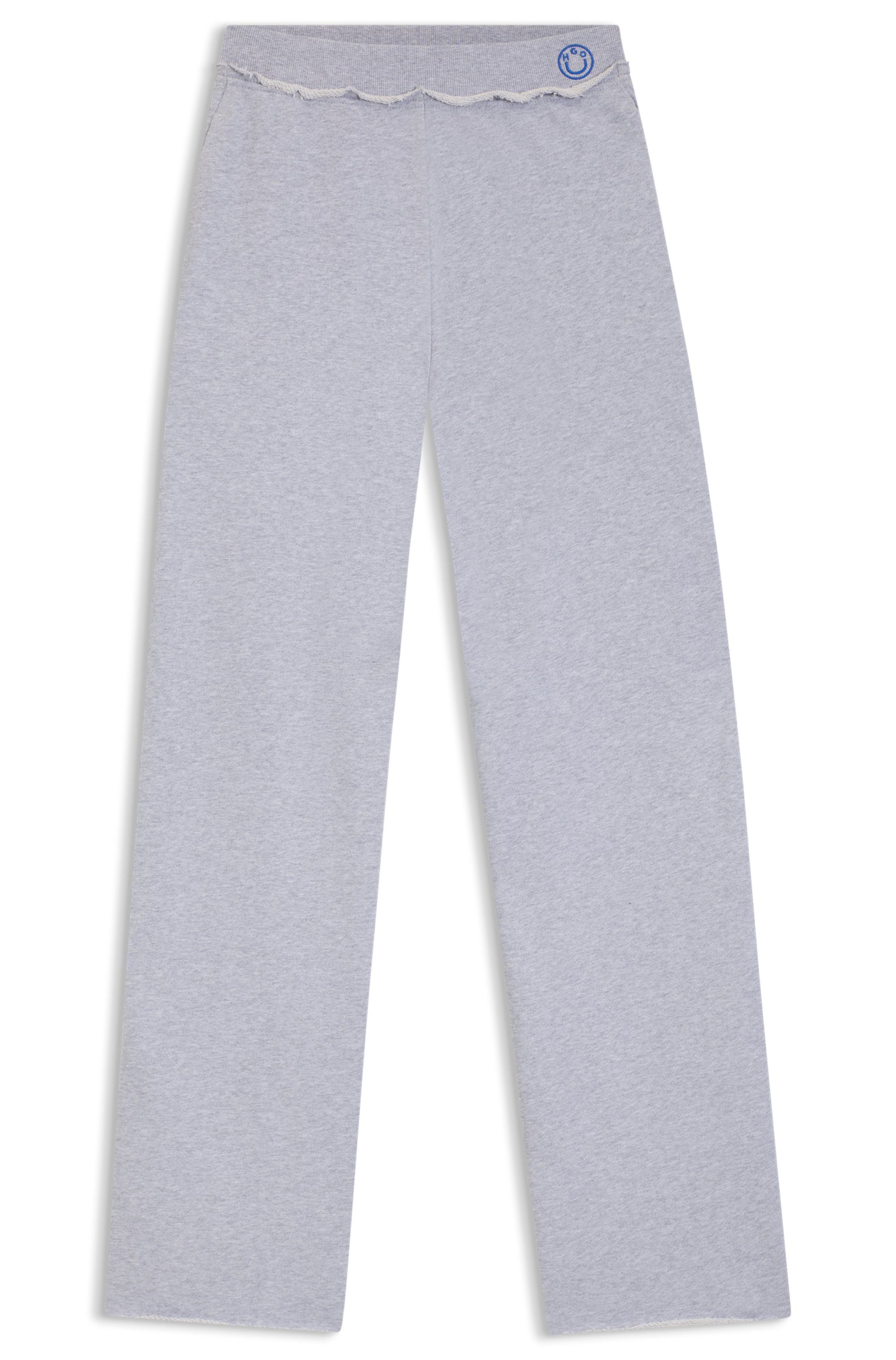 HUGO Jogger Pants Nuwaist mit Raw Cut Hem, weites Bein