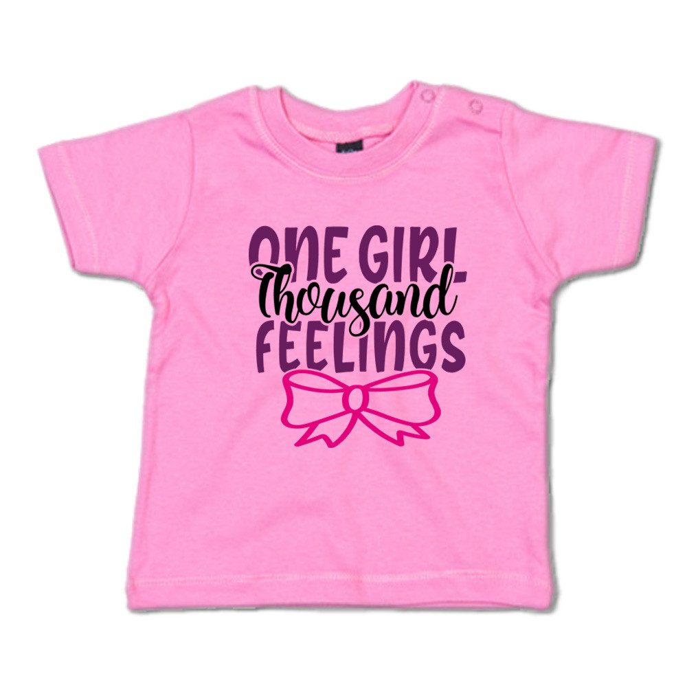 G-graphics T-Shirt One girl, thousand feelings Baby T-Shirt, mit Spruch / Sprüche / Print / Aufdruck