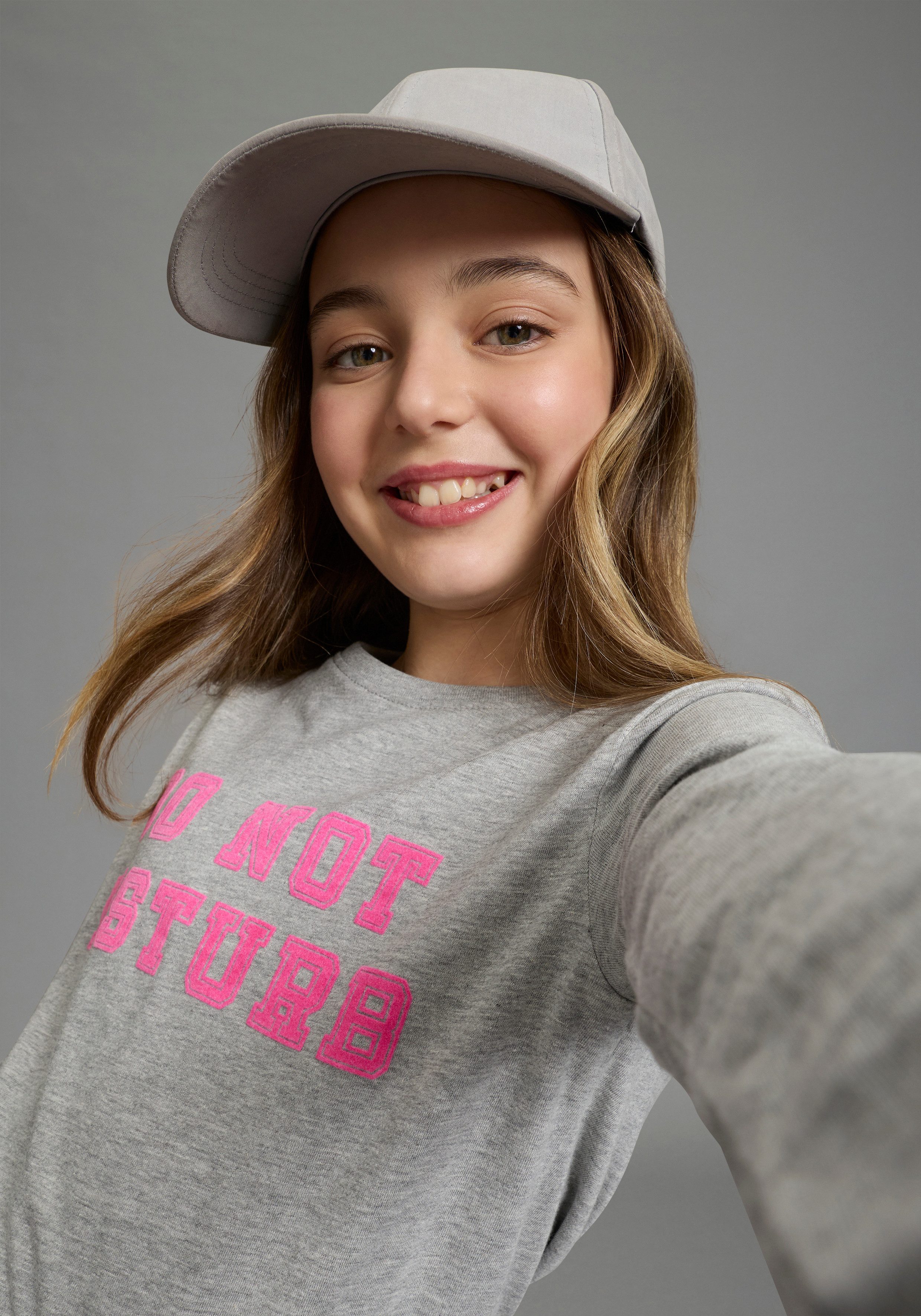 KIDSWORLD Langarmshirt Cooler Spruch: DO NOT DISTURB! - Nicht stören! modischer Stil, Langarm, bedruckte Optik mit Statements
