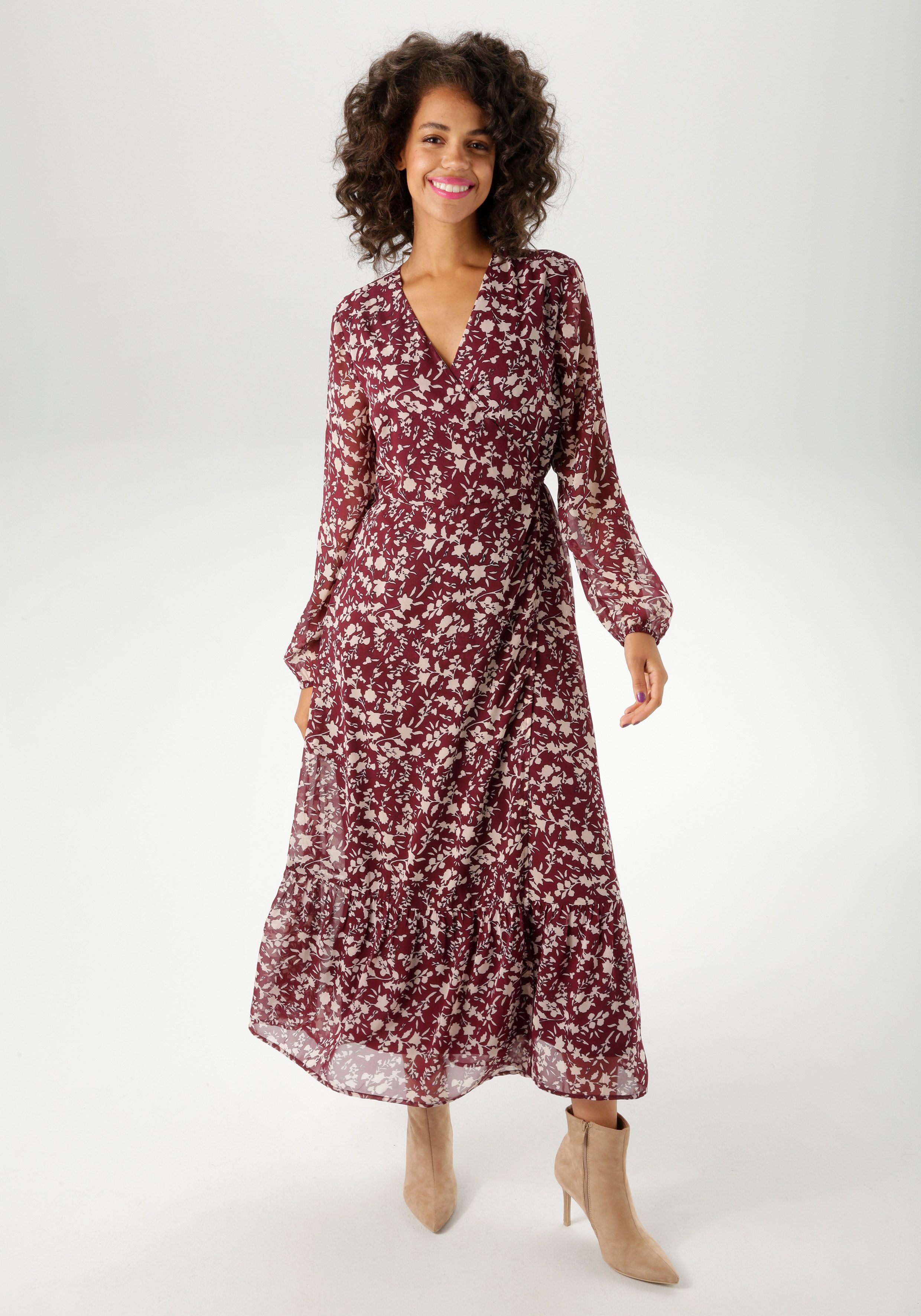 Aniston CASUAL Wickelkleid mit grafischen Blumendruck günstig online kaufen