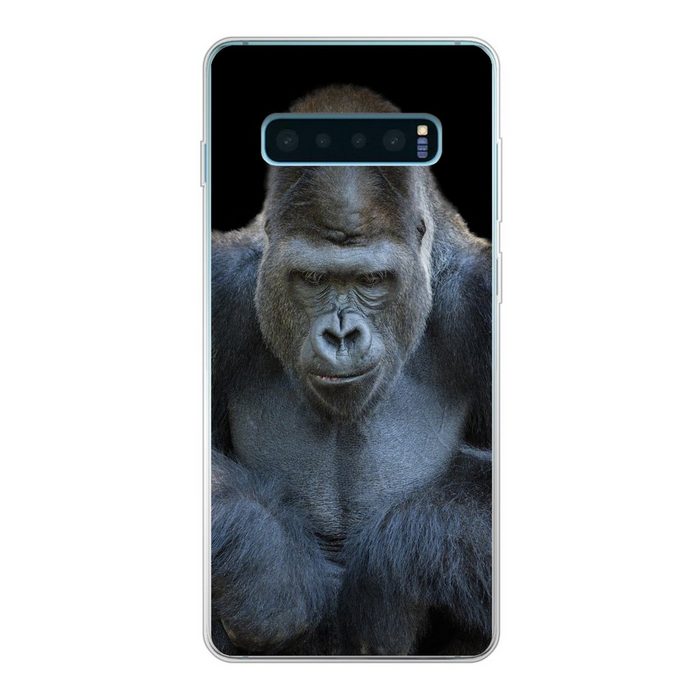 MuchoWow Handyhülle Ein Gorilla schaut eindrucksvoll in die Kamera Phone Case Handyhülle Samsung Galaxy S10+ Silikon Schutzhülle