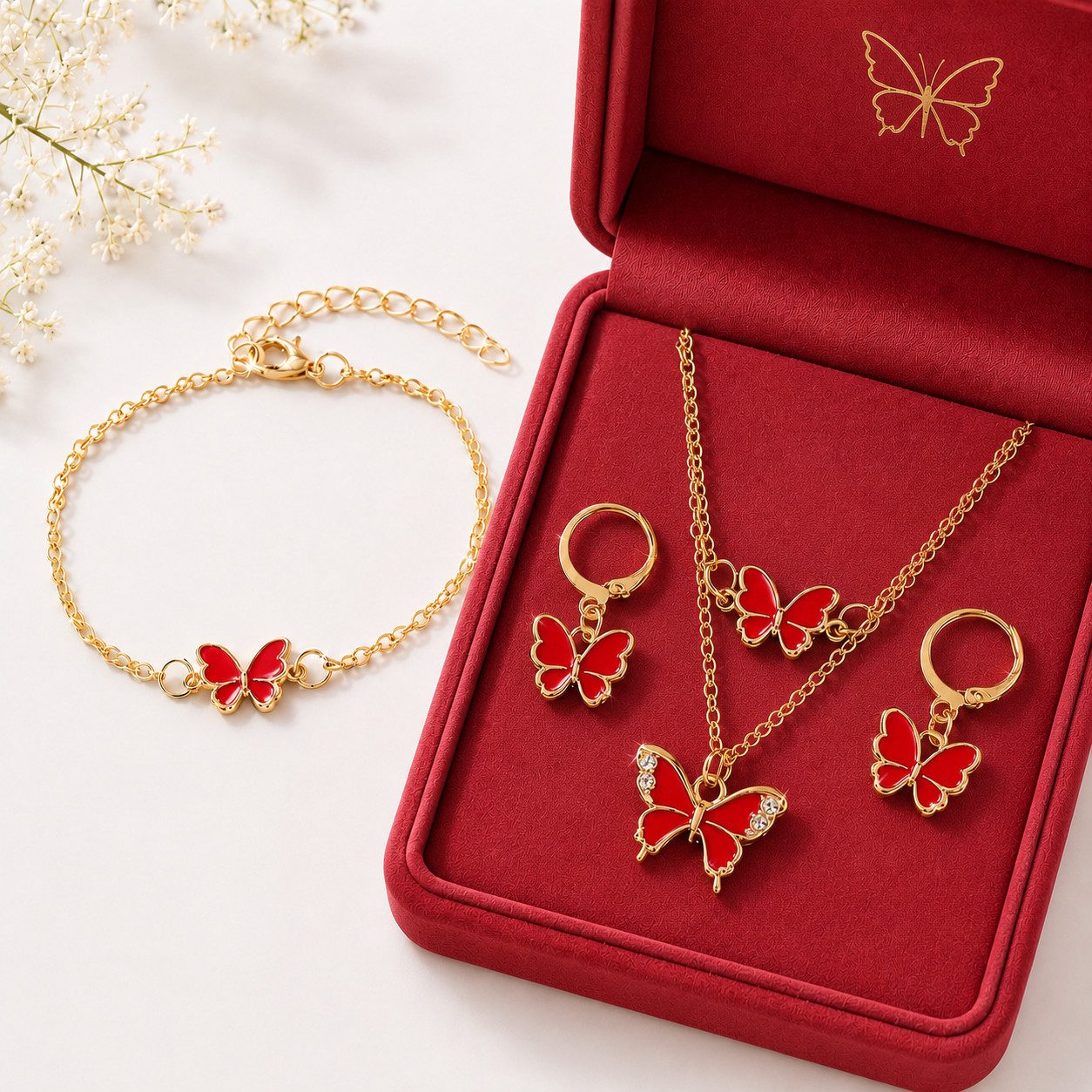 ILOKEN Ohrring und Ketten Set Schmetterling-Schmuckset mit Zirkonia, 4-tlg. goldfarben (Schmuckset, 4-tlg., Halskette, Ohrringe, Armband), 4-teilig; Schmetterlingsdesign; Zirkonia; goldfarben