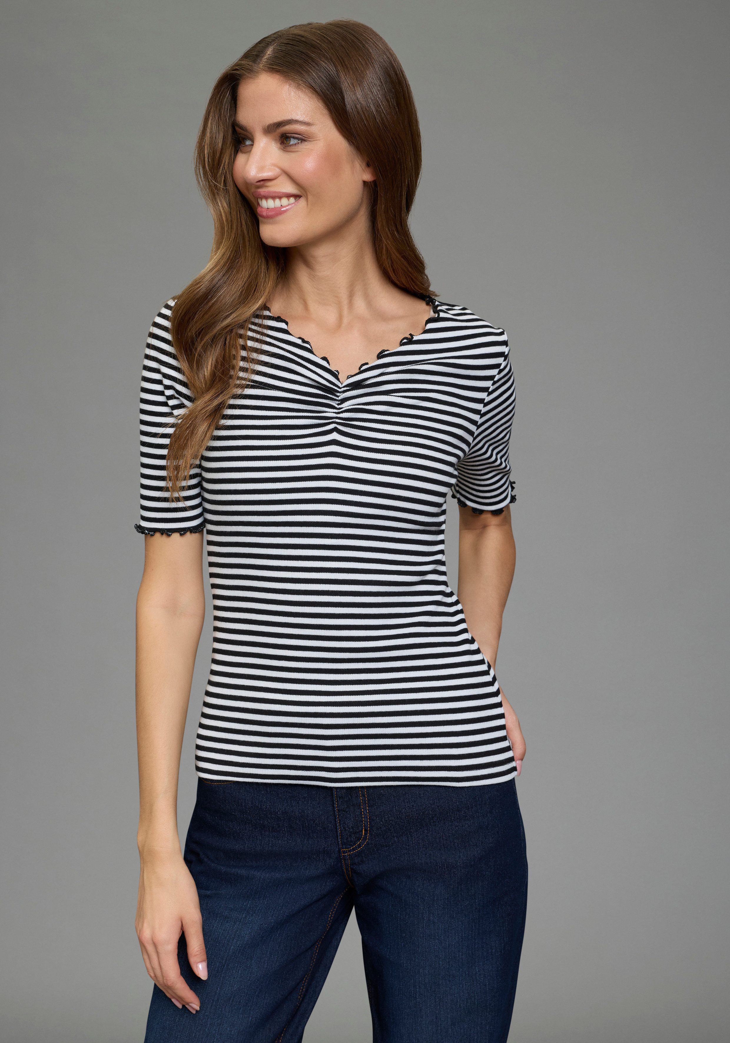 Flashlights T-Shirt im Streifen-Design mit Rüschen. € 24,99, (€ 24,99 pro 1 Stk).