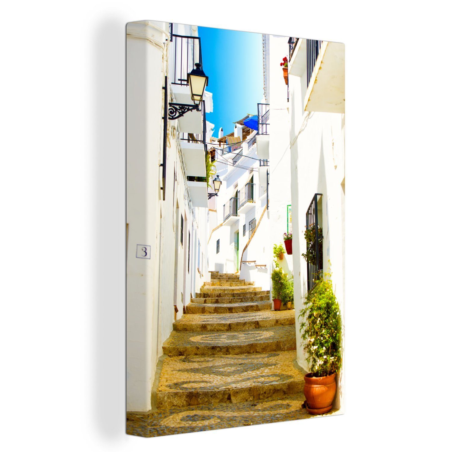 OneMillionCanvasses® Leinwandbild Traditionelle Straße mit weißen Fassaden in Málaga, Spanien, (1 St), Leinwandbild fertig bespannt inkl. Zackenaufhänger, Gemälde, 20x30 cm